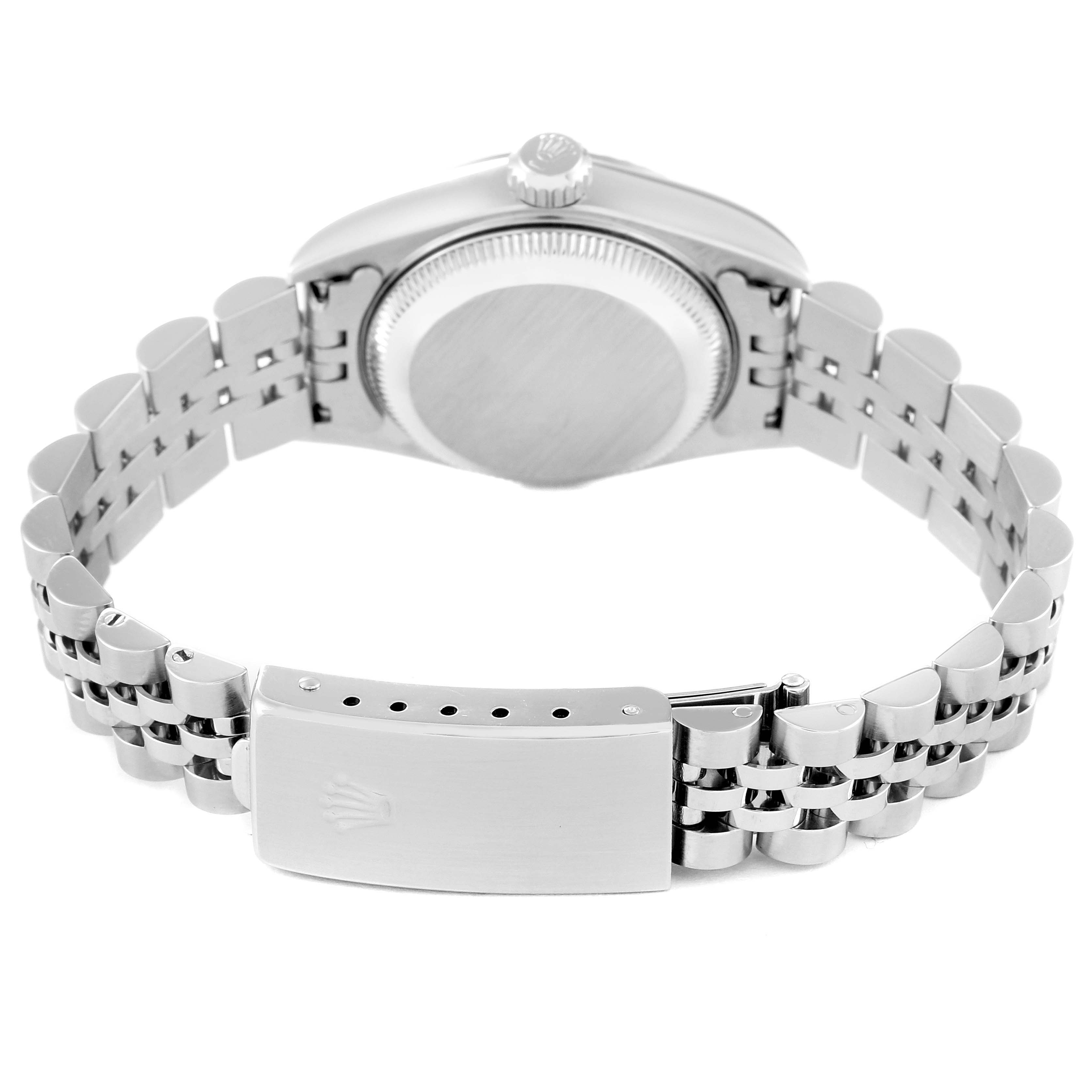 The image shows the back view of the Rolex Datejust 79174 Women's Stainless Steel White Dial 79174 Women's Stainless Steel White Dial watch, displaying its case back, crown, and bracelet with a clasp.