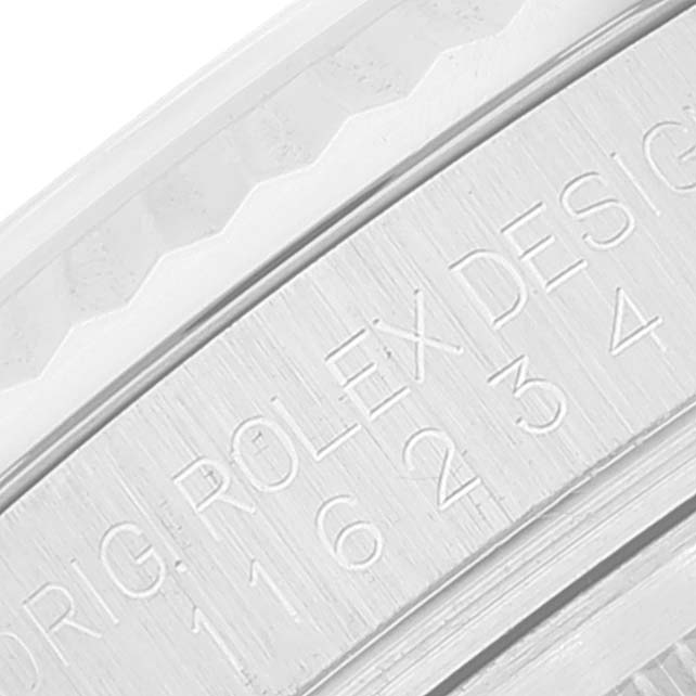 The image shows a close-up view of the bezel and inner rim with engraved text of a Rolex Datejust 116234 Men's Stainless Steel White Dial 116234 Men's Stainless Steel White Dial model.
