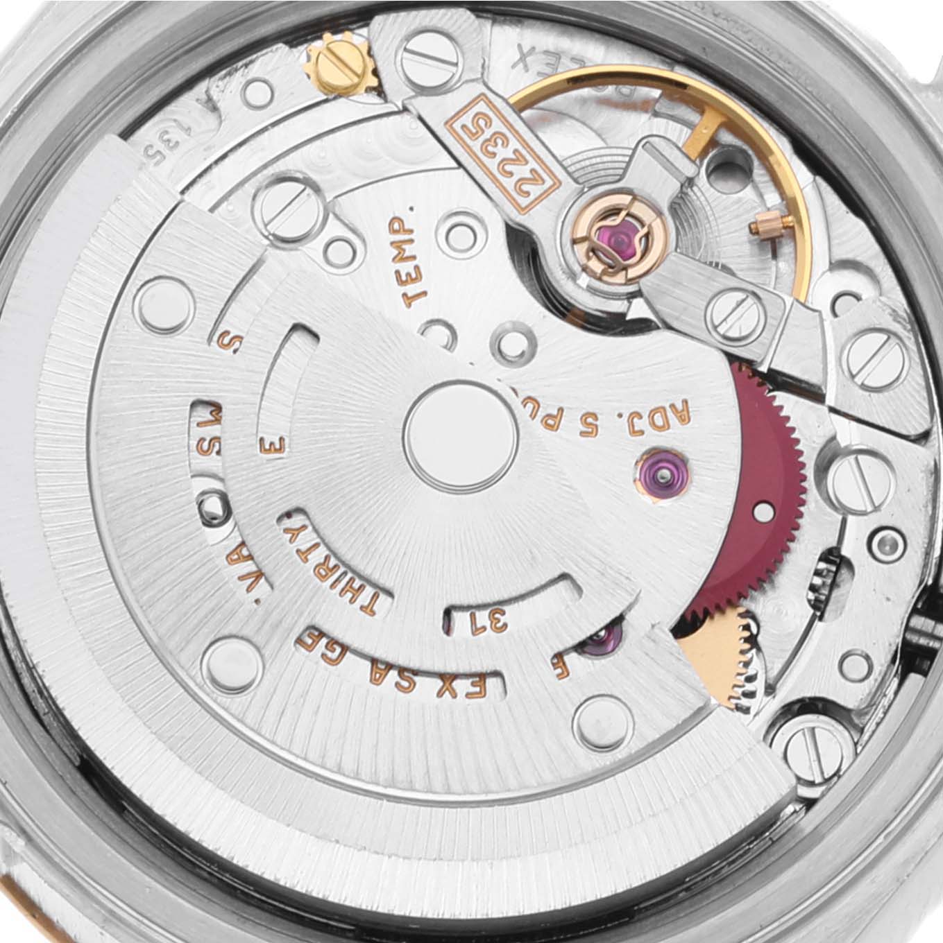 This image shows a close-up view of the movement mechanism of a Rolex Datejust 79173 Women's Steel and Gold (two tone) Champagne Dial 79173 Women's Steel and Gold (two tone) Champagne Dial watch, showcasing its intricate parts.