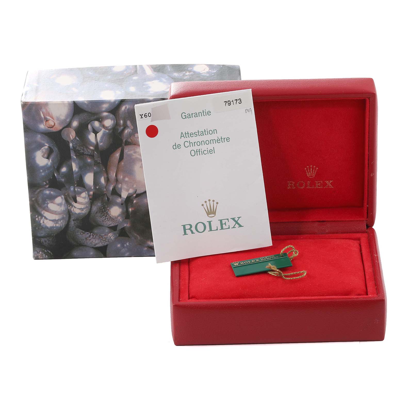 The image shows a Rolex Datejust 79173 Women's Steel and Gold (two tone) Champagne Dial 79173 Women's Steel and Gold (two tone) Champagne Dial watch box, warranty card, and tag from a frontal angle.