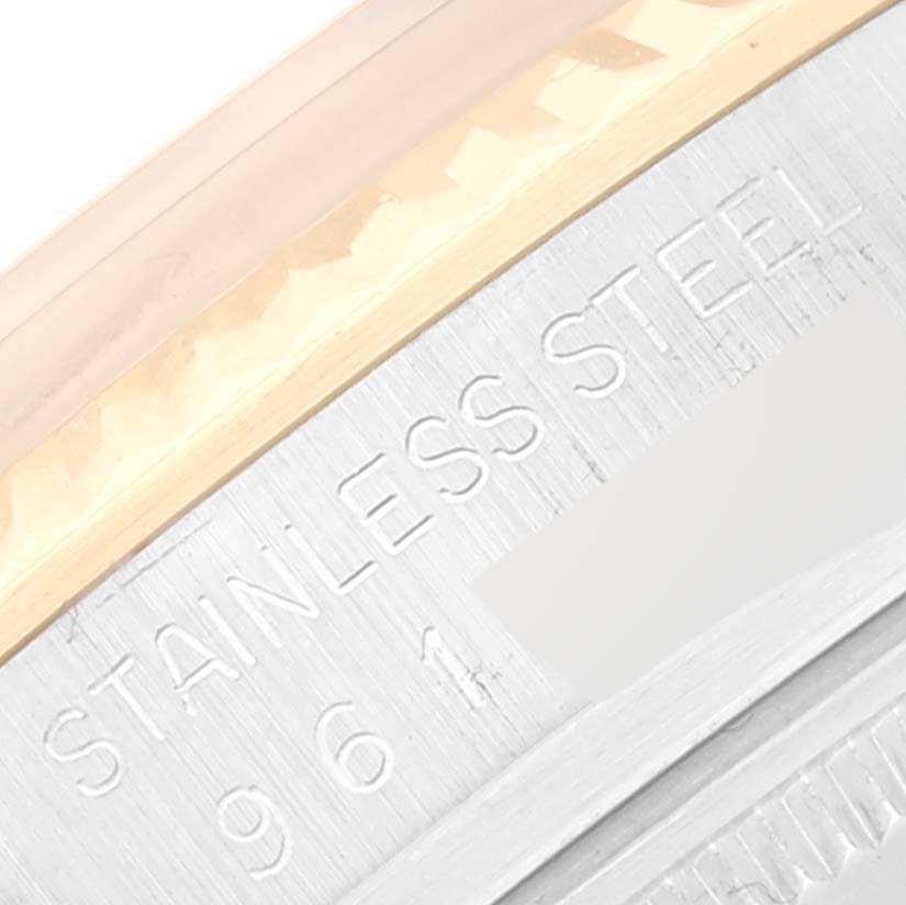 This image shows a close-up of the case detailing and engraving on a Rolex Datejust 16013 Men's Steel and Gold (two tone) Silver Dial 16013 Men's Steel and Gold (two tone) Silver Dial watch, highlighting the "Stainless Steel" text.