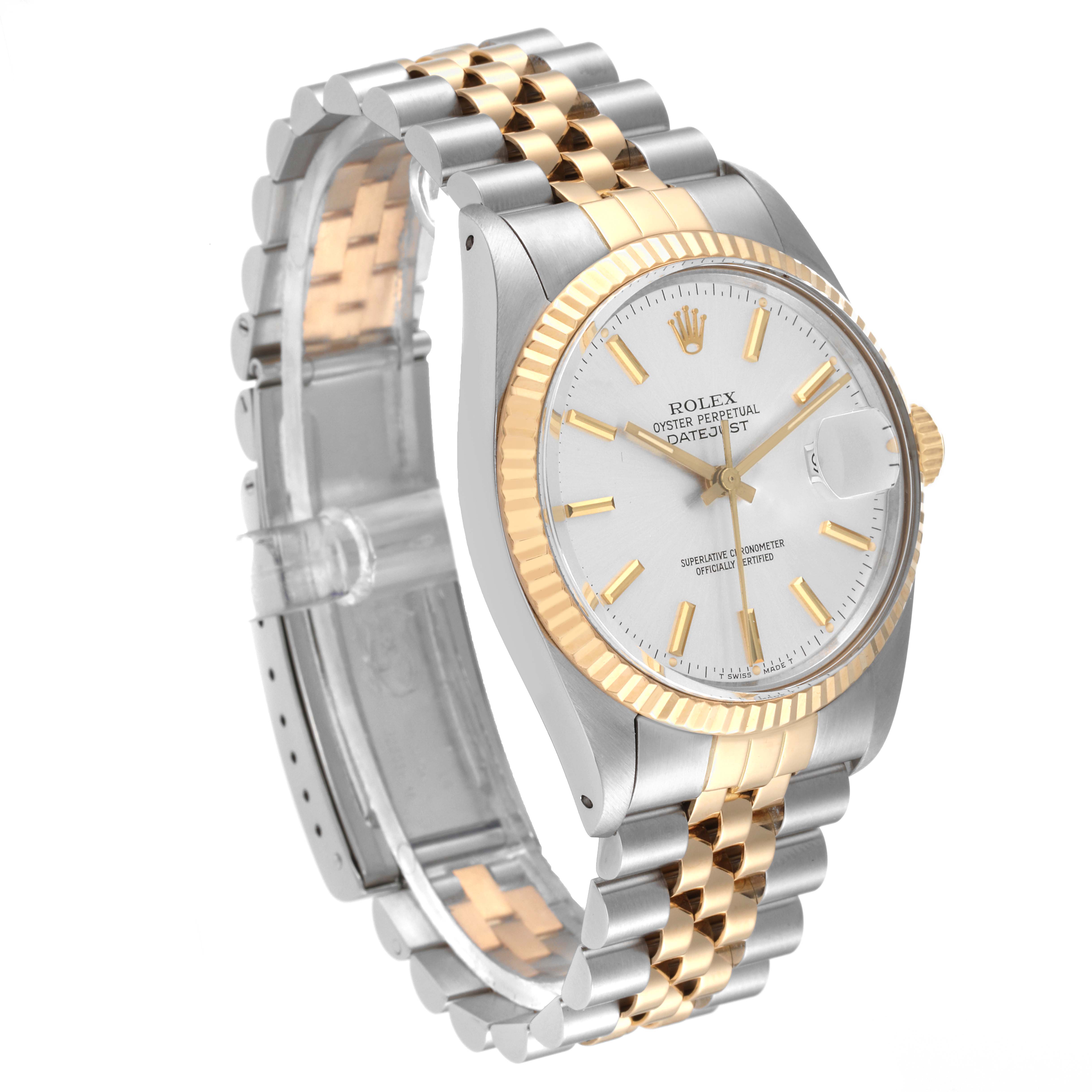 This image shows a Rolex Datejust 16013 Men's Steel and Gold (two tone) Silver Dial 16013 Men's Steel and Gold (two tone) Silver Dial watch at a front-side angle, showcasing its dial, bezel, and Jubilee bracelet.