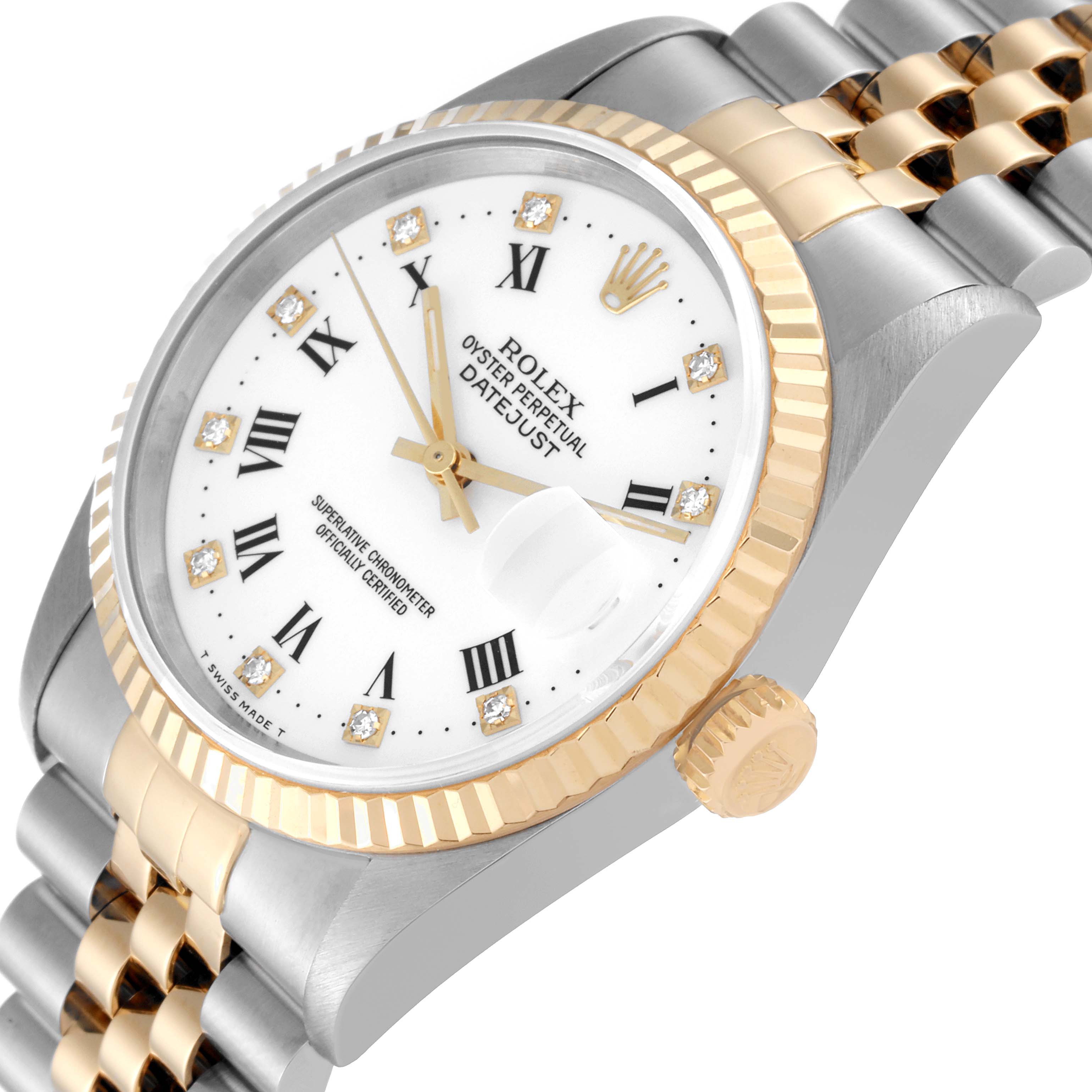 This image shows a Rolex Datejust 16233 Men's Steel and Gold (two tone) White Dial 16233 Men's Steel and Gold (two tone) White Dial watch at an angle displaying its dial, fluted bezel, crown, and two-tone bracelet.