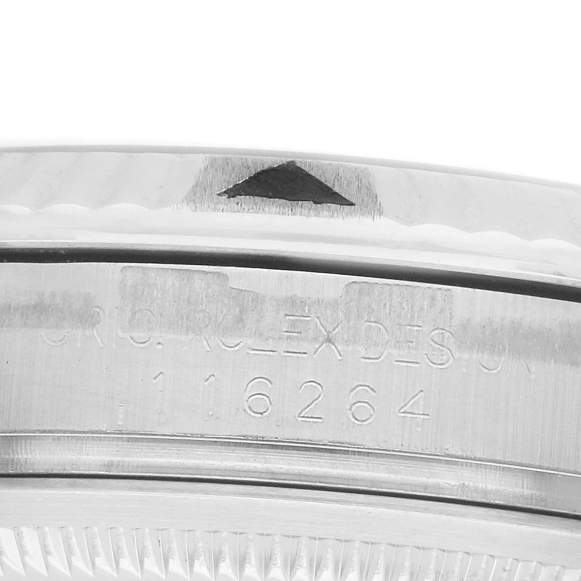 The image shows a close-up of the side of the Rolex Datejust 116264 Men
s Stainless Steel Blue Dial, highlighting the case engraving and part of the bezel.