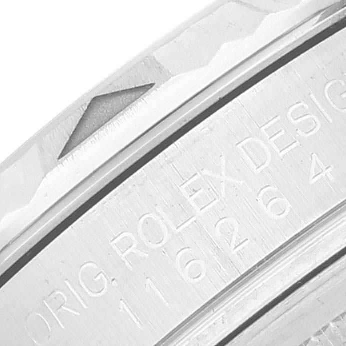 This image shows a close-up side view of the bezel and engraved markings on the Rolex Turn-o-Graph 116264 Men's Stainless Steel White Dial 116264 Men's Stainless Steel White Dial model.