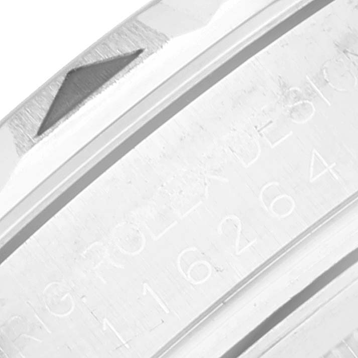 This image shows a close-up of the bezel and engraved serial number of a Rolex Turn-o-Graph 116264 Men
s Stainless Steel White Dial 116264 Men
s Stainless Steel White Dial watch.