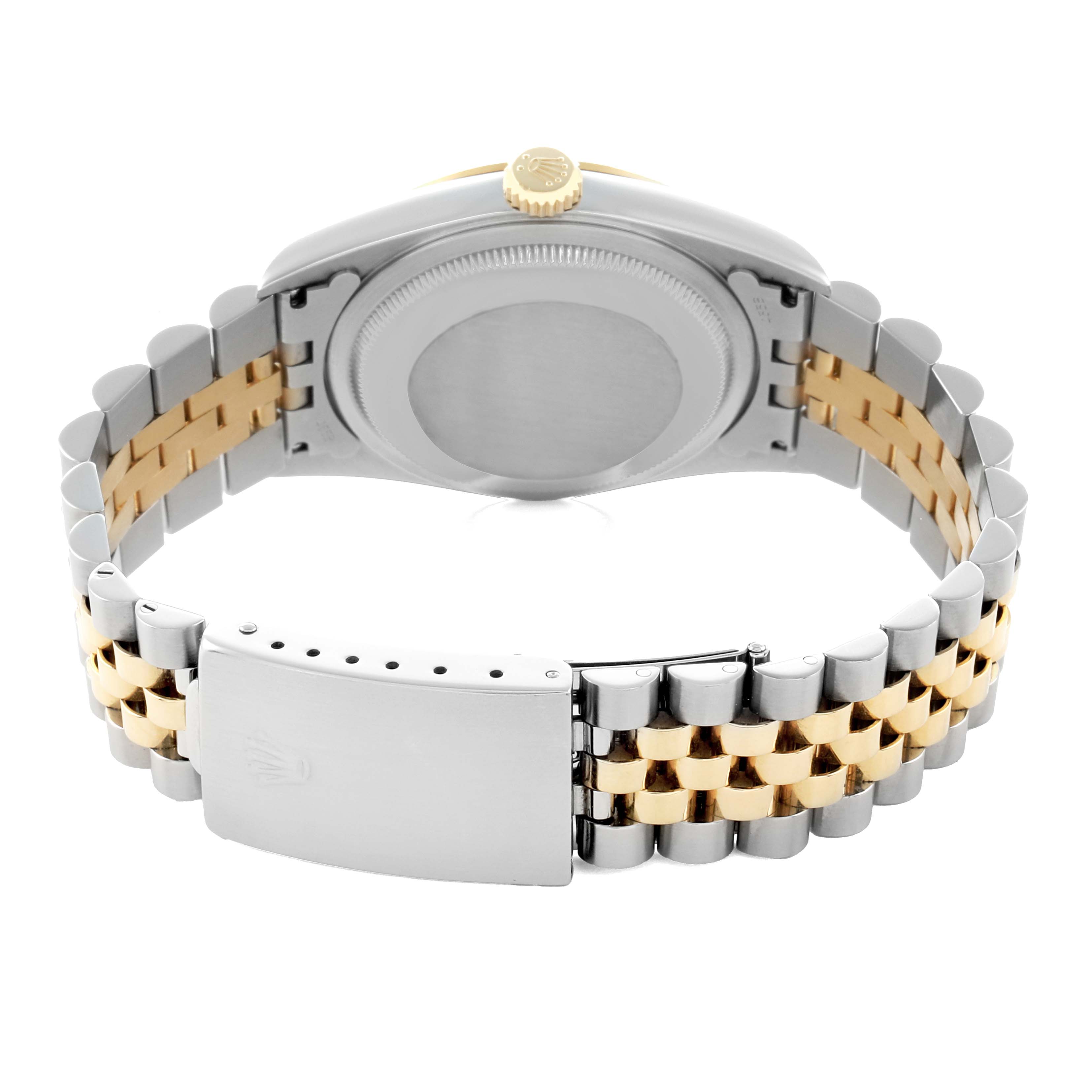 The image shows the back of a Rolex Datejust 16233 Men
s Steel and Gold (two tone) Champagne Dial, highlighting the case back, crown, and two-tone bracelet with clasp.