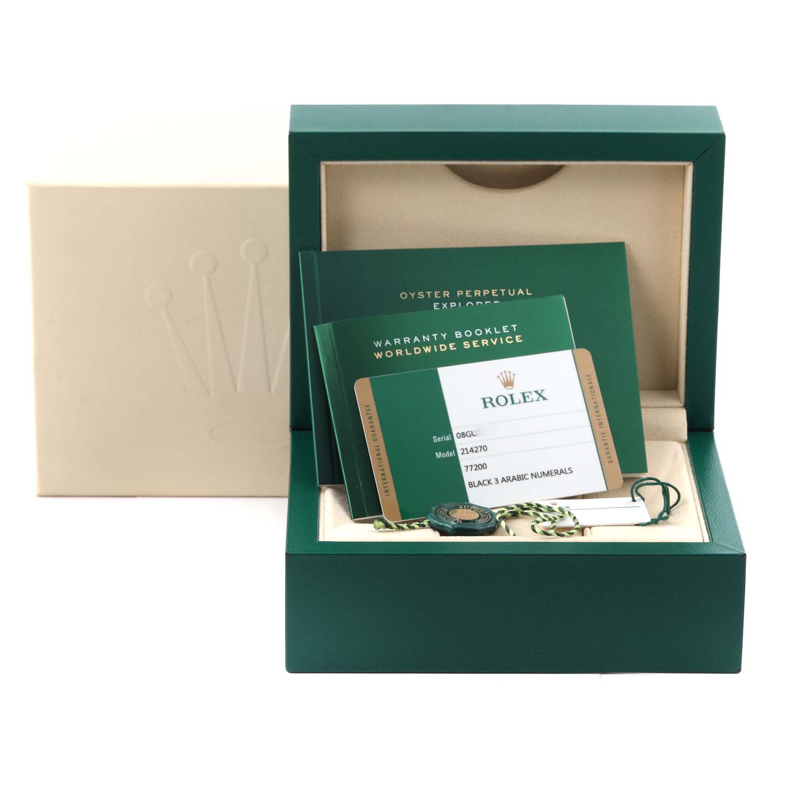 The image shows a Rolex Explorer 214270 Men
s Stainless Steel Black Dial 214270 Men
s Stainless Steel Black Dial watch box with warranty cards and tags displayed at a front angle.