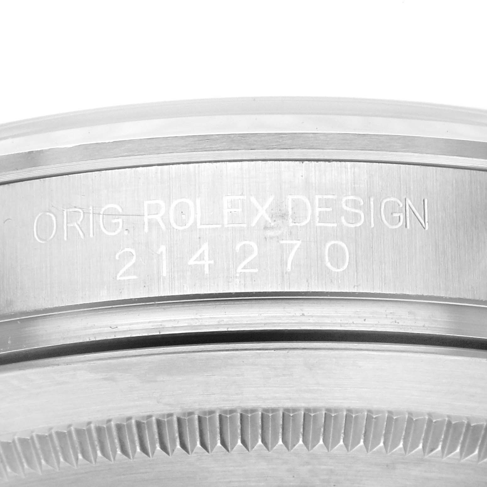 The image shows a close-up of the engraved casing side of a Rolex Explorer 214270 Men
s Stainless Steel Black Dial 214270 Men
s Stainless Steel Black Dial watch, highlighting the model number 214270.
