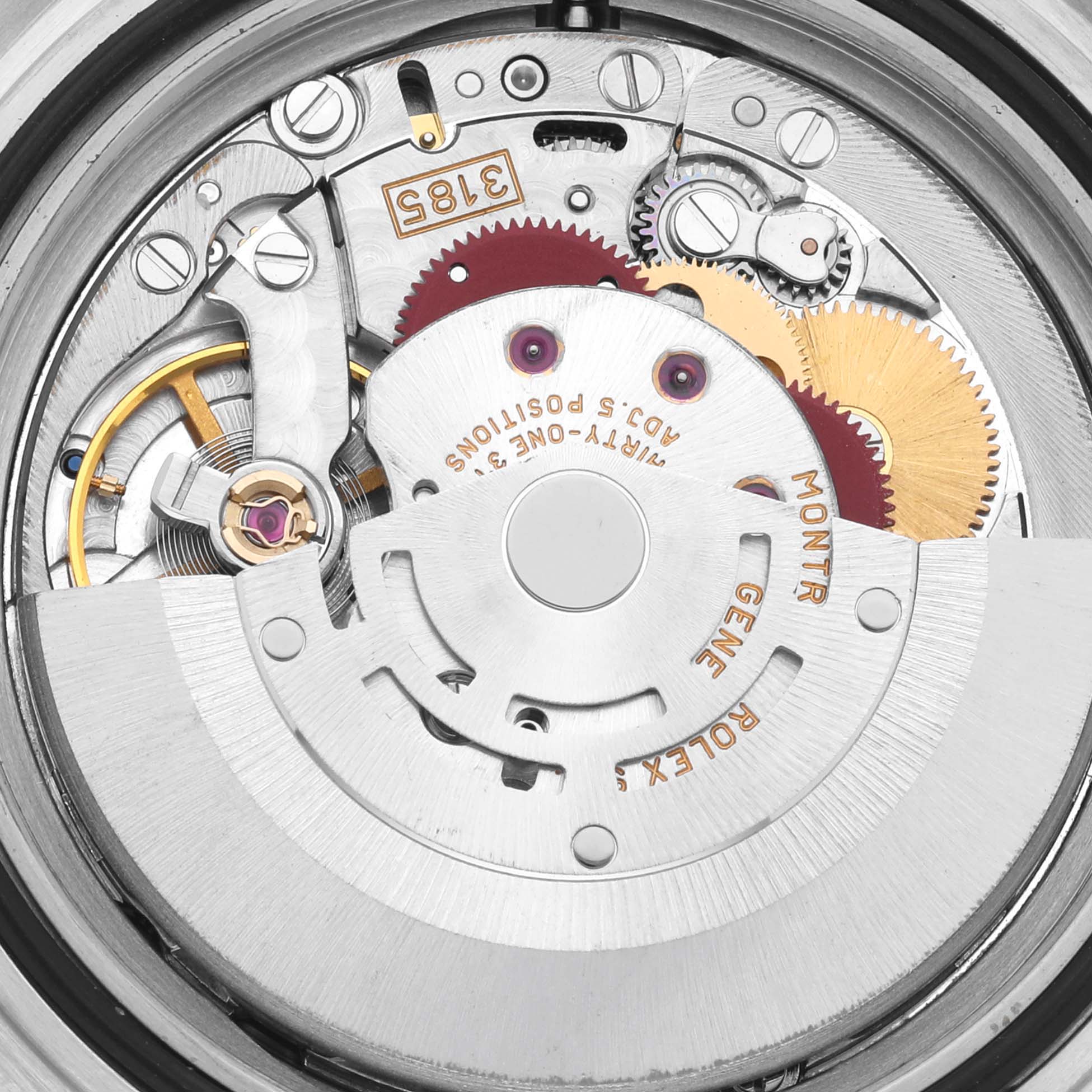 The image shows the internal movement of the Rolex GMT-Master 16710 Men
s Stainless Steel Black Dial 16710 Men
s Stainless Steel Black Dial, highlighting gears and rotors from a top-down angle.