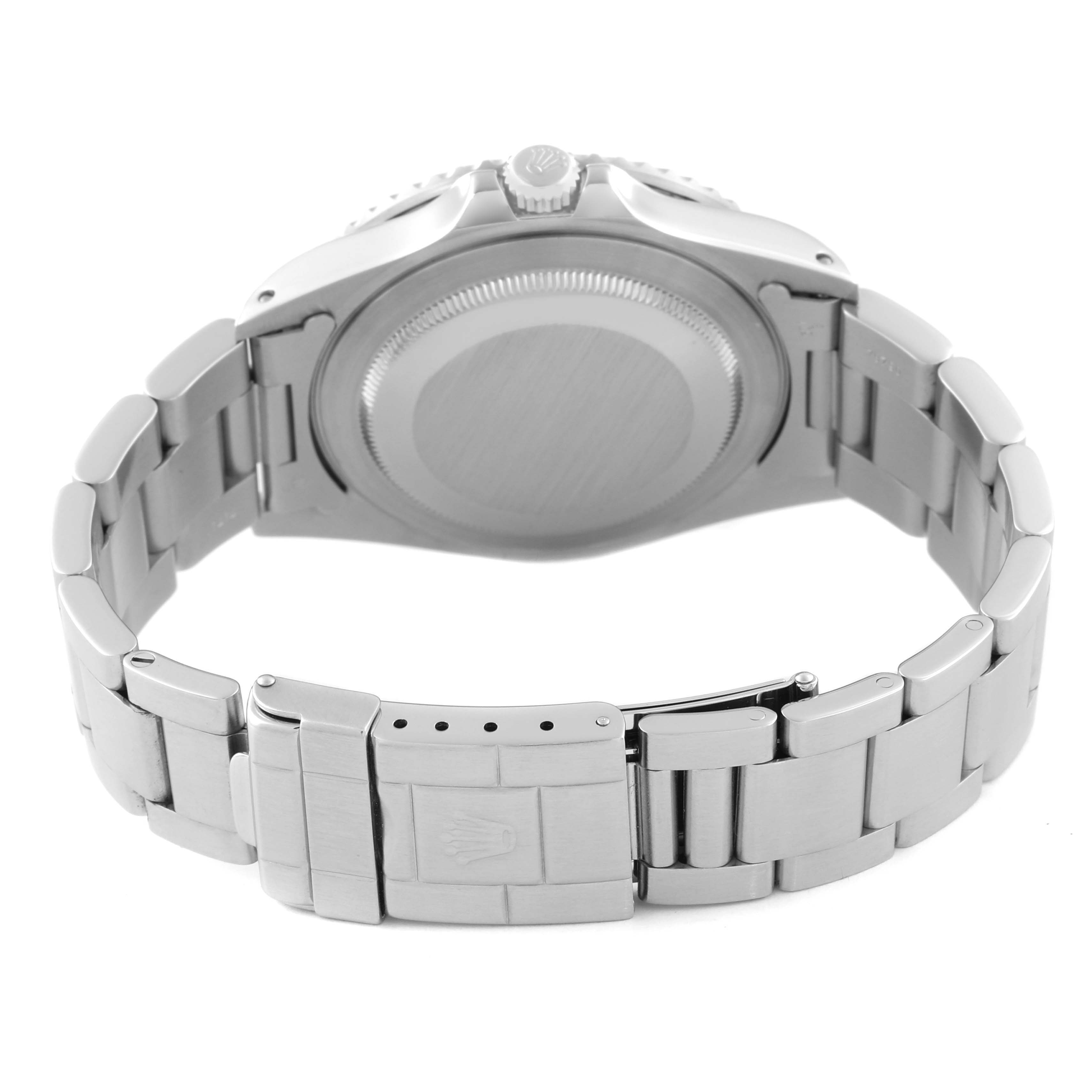 The image shows the back of a Rolex GMT-Master 16700 Men
s Stainless Steel Black Dial 16700 Men
s Stainless Steel Black Dial watch, focusing on the case back and the metal bracelet.