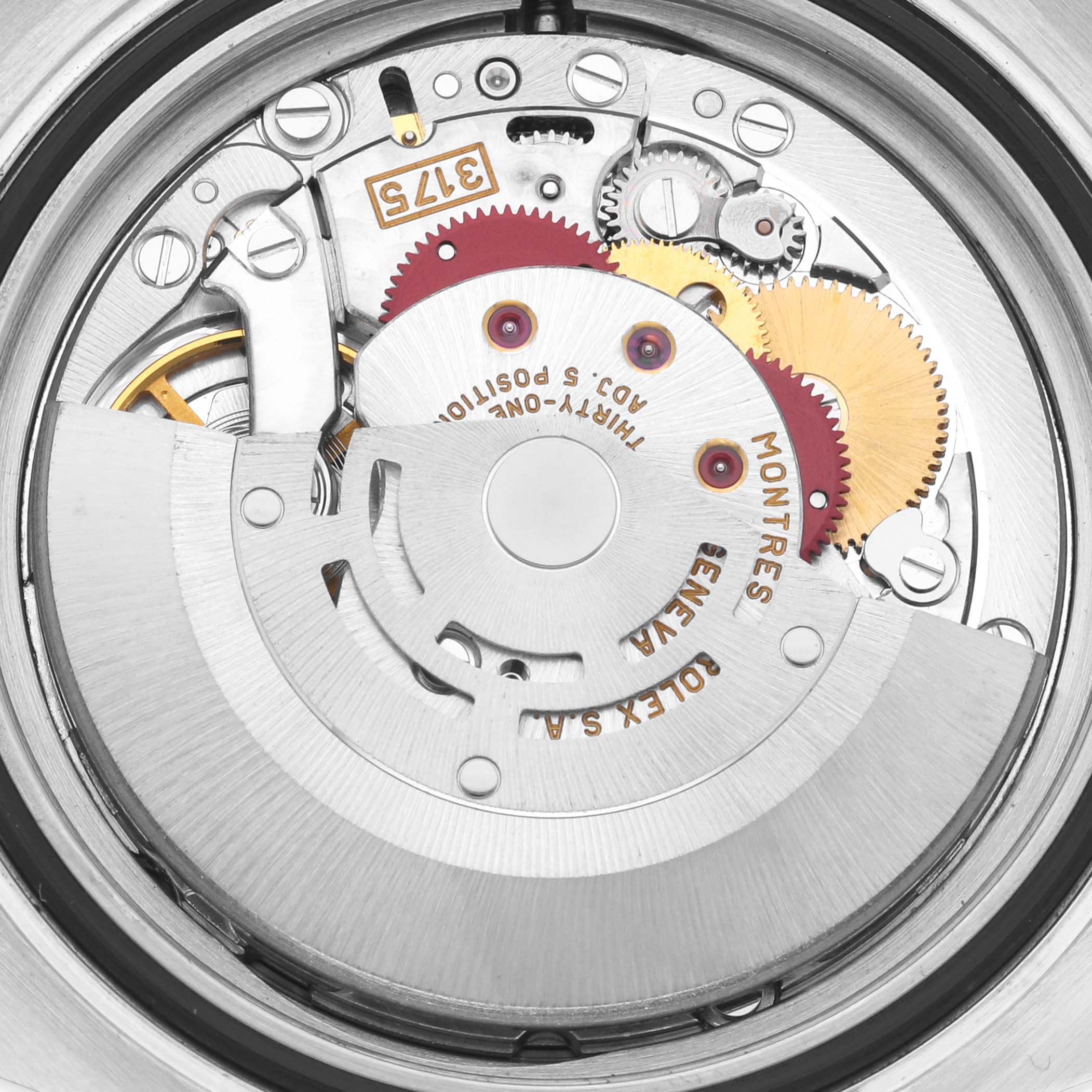 The image shows the movement of a Rolex GMT-Master 16700 Men
s Stainless Steel Black Dial 16700 Men
s Stainless Steel Black Dial watch, highlighting gears and mechanical components from a top angle.