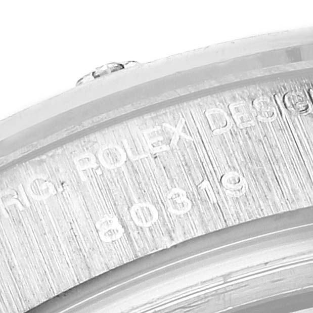 The close-up image shows the engraved details on the bezel of the Rolex Pearlmaster 80319 Women's White Gold Mother of Pearl Dial 80319 Women's White Gold Mother of Pearl Dial watch.
