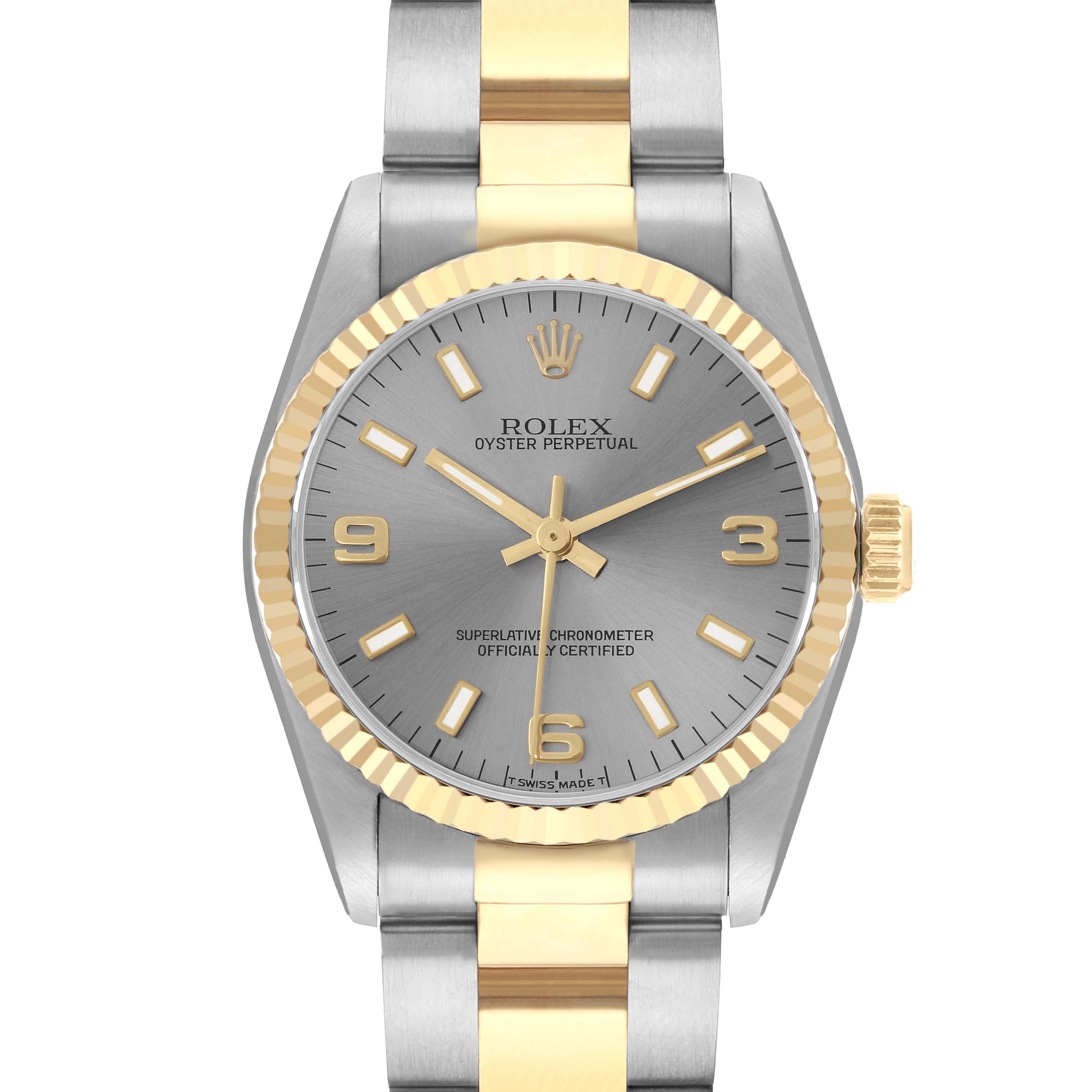 The Rolex Oyster Perpetual 67513 Women
s Steel and Gold (two tone) Silver Dial watch is shown from a front angle, displaying its silver and gold bezel, dial, and bracelet.
