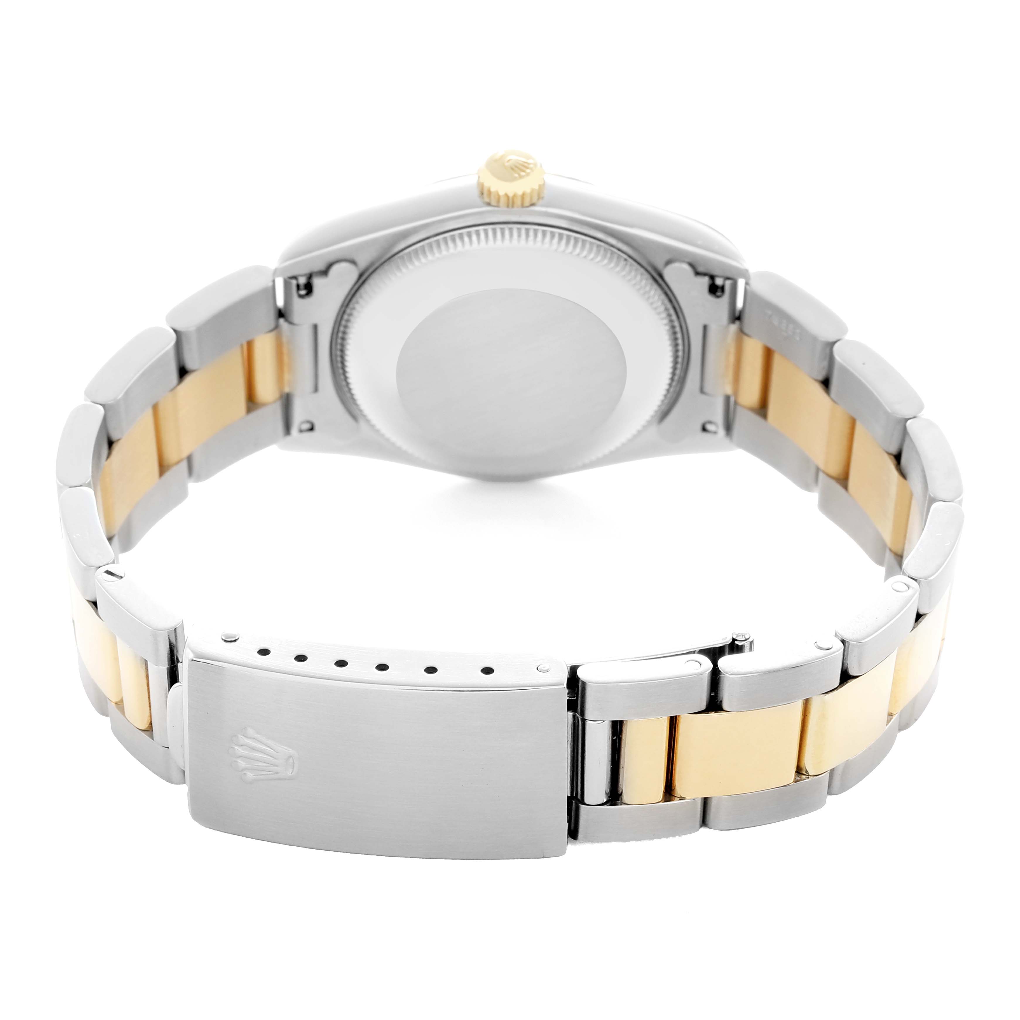 The image shows the back view of a Rolex Oyster Perpetual 67513 Women
s Steel and Gold (two tone) Silver Dial, highlighting the metal bracelet and clasp.