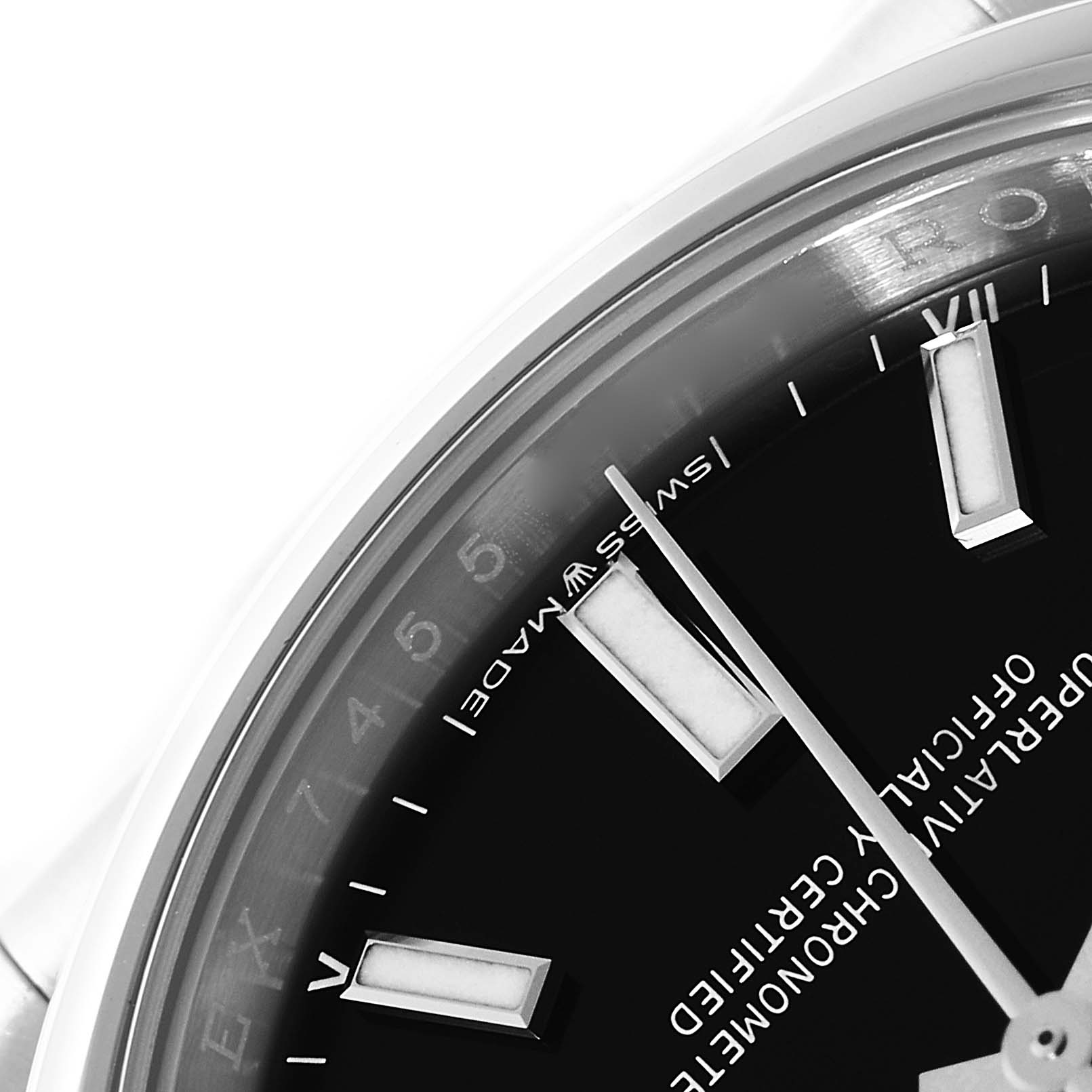 The close-up image shows part of the dial and hands of a Rolex Oyster Perpetual 124200 Men's Stainless Steel Black Dial 124200 Men's Stainless Steel Black Dial watch, focusing on the "Swiss Made" text.