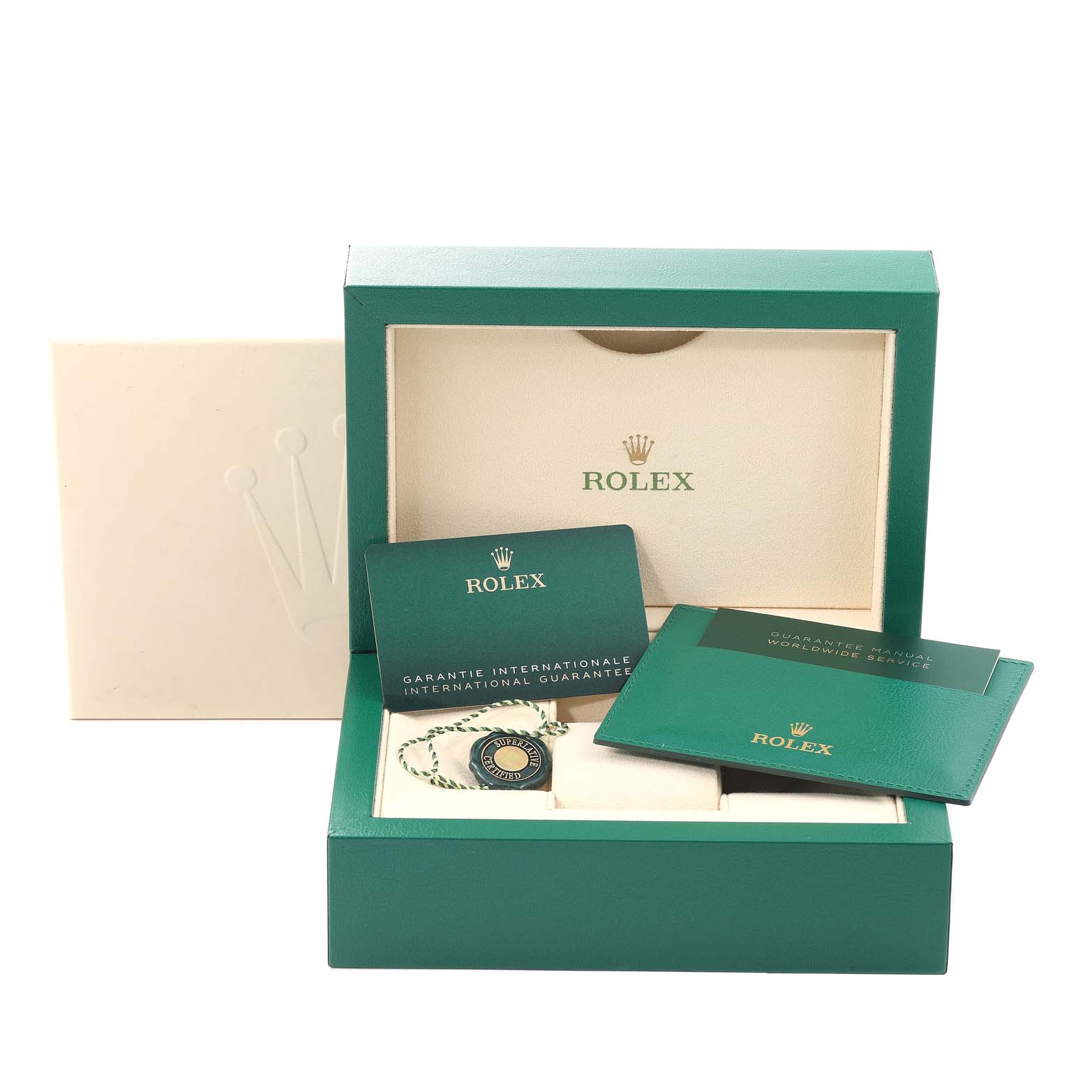 This image shows a green Rolex Oyster Perpetual 124200 Men's Stainless Steel Black Dial 124200 Men's Stainless Steel Black Dial watch box with guarantee cards and a tag.