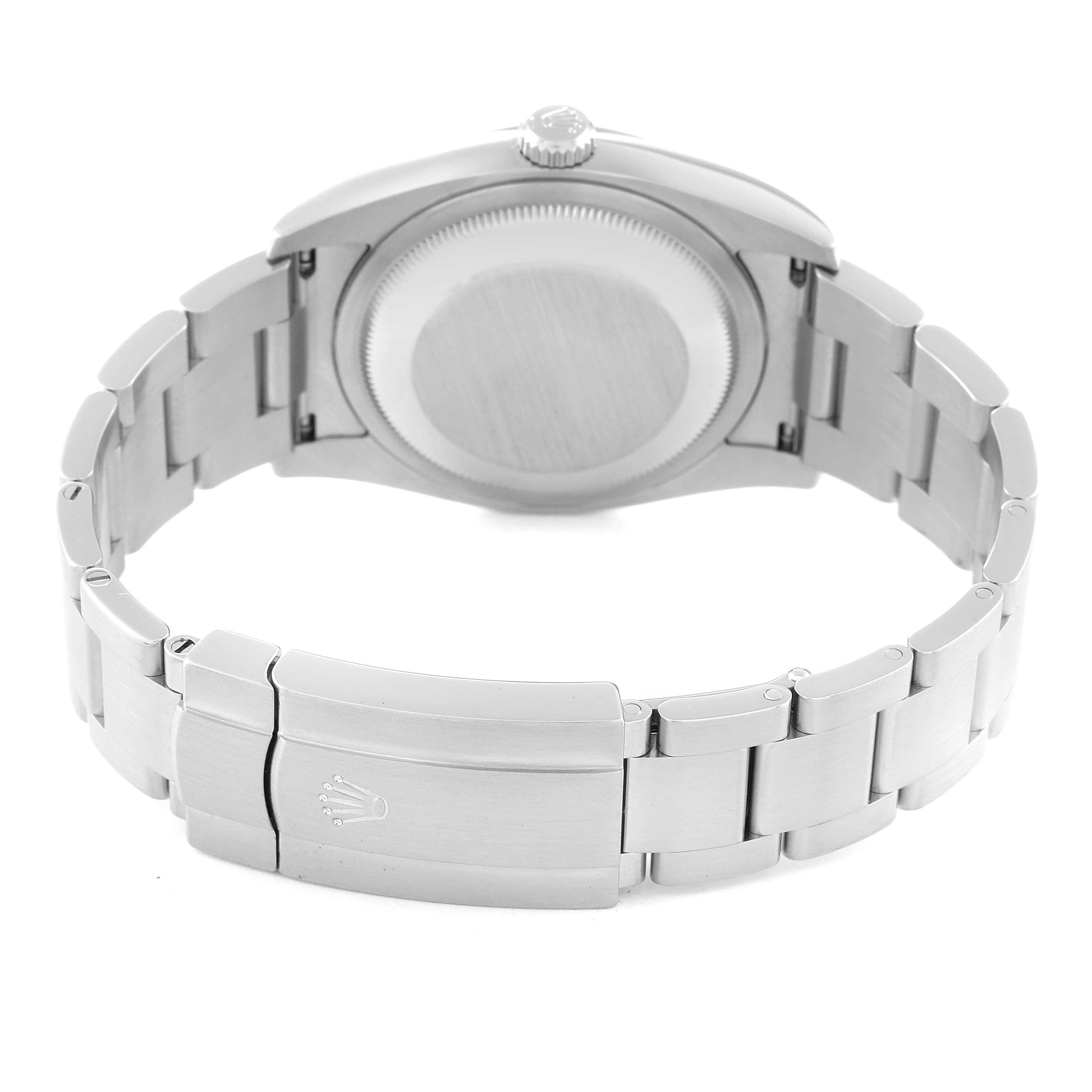 This image shows the back and clasp of a Rolex Oyster Perpetual 116000 Men
s Stainless Steel Purple Dial 116000 Men
s Stainless Steel Purple Dial watch at a slightly angled view.