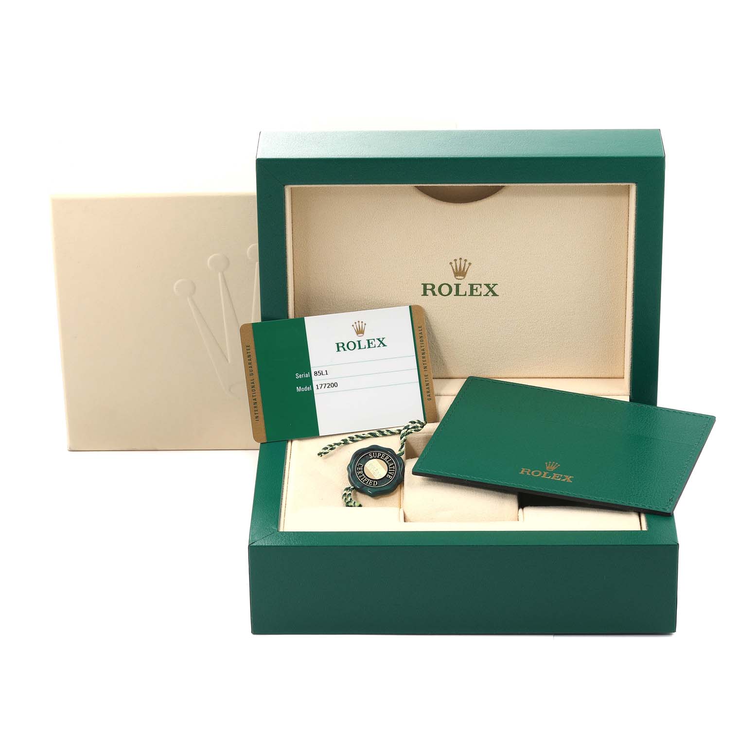 The image shows the packaging and accessories of a Rolex Mid-Size 177200 Women's Stainless Steel Burgundy Dial 177200 Women's Stainless Steel Burgundy Dial model, including the box, warranty card, manual, and tag.