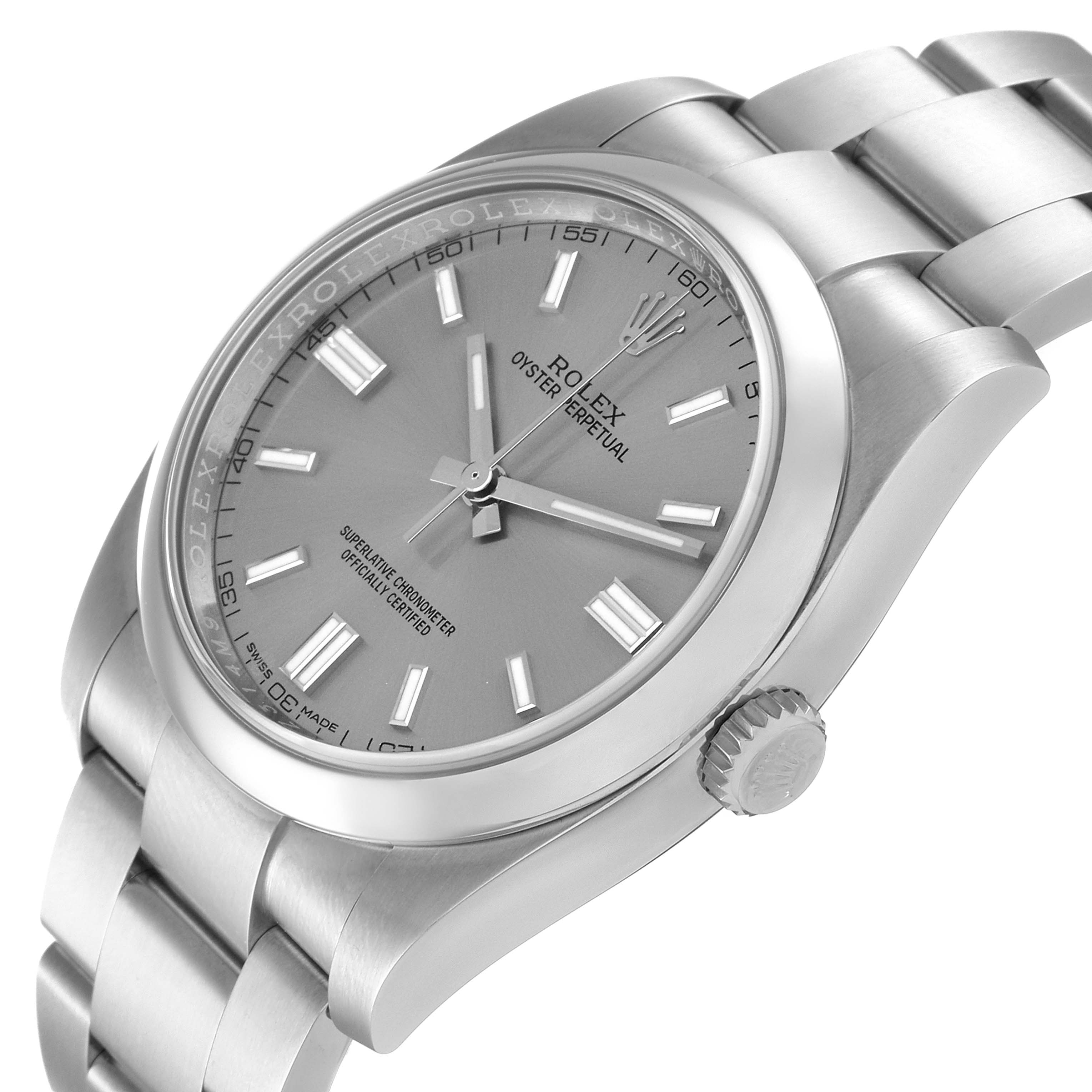 This image shows a Rolex Oyster Perpetual 116000 Men
s Stainless Steel Grey Dial 116000 Men
s Stainless Steel Grey Dial watch at a three-quarter angle displaying the face, crown, and part of the bracelet.