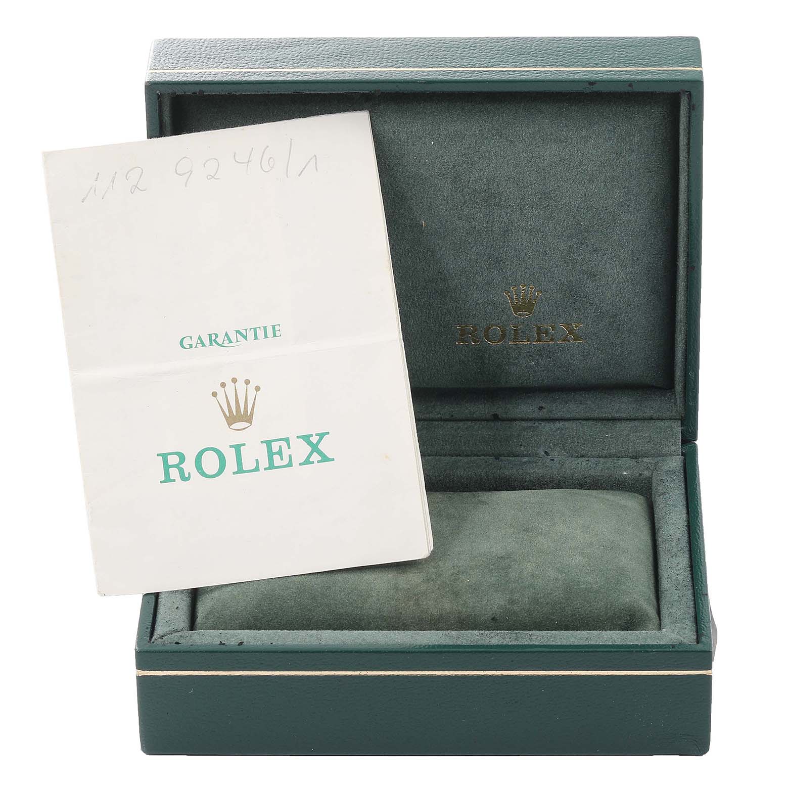The image shows an open green Rolex Oyster Perpetual 67193 Women
s Steel and Gold (two tone) White Dial 67193 Women
s Steel and Gold (two tone) White Dial watch box with a guarantee booklet inside.