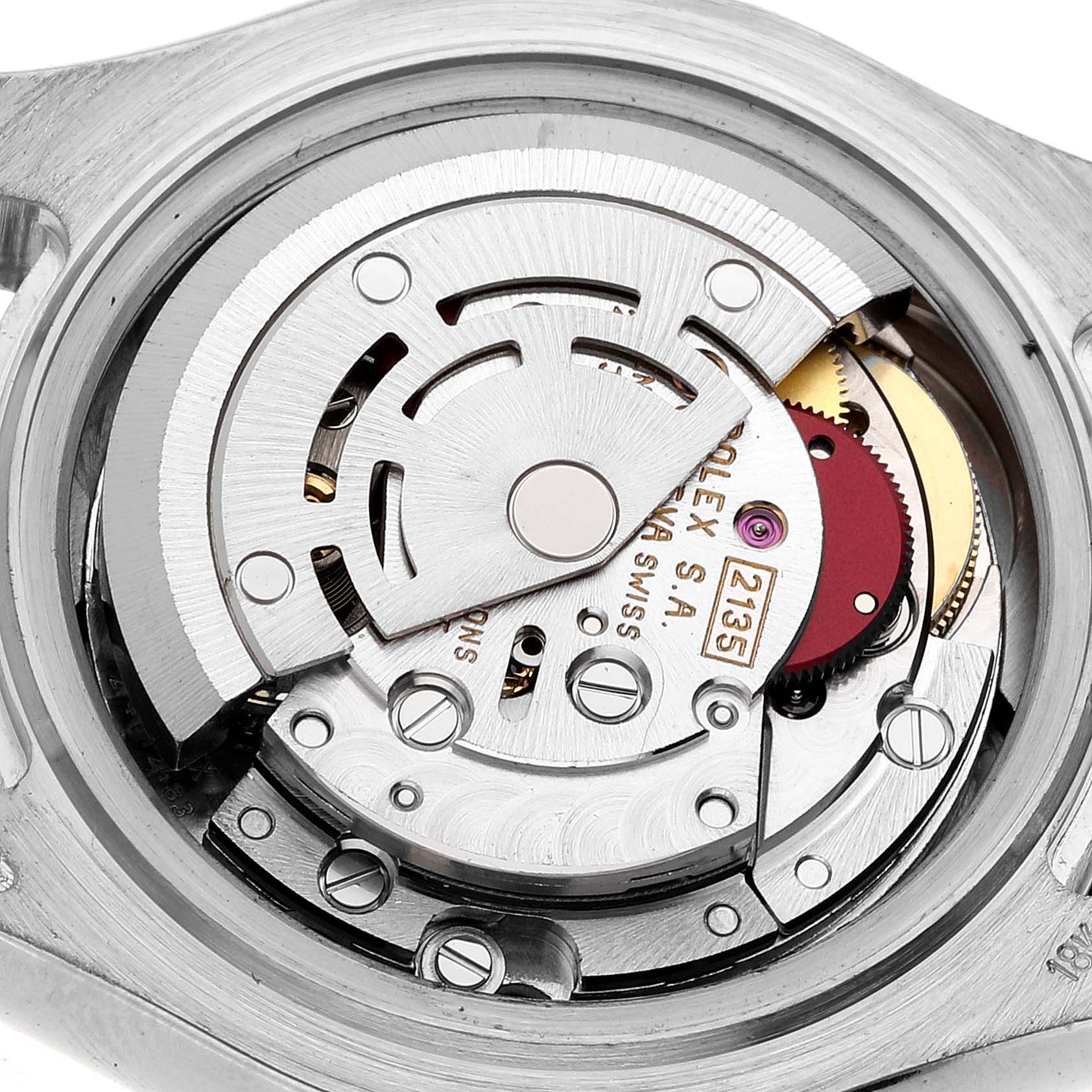 This is an angled close-up view of the Rolex Pearlmaster 69329 Women's White Gold Mother of Pearl Dial 69329 Women's White Gold Mother of Pearl Dial watch's internal movement mechanism.