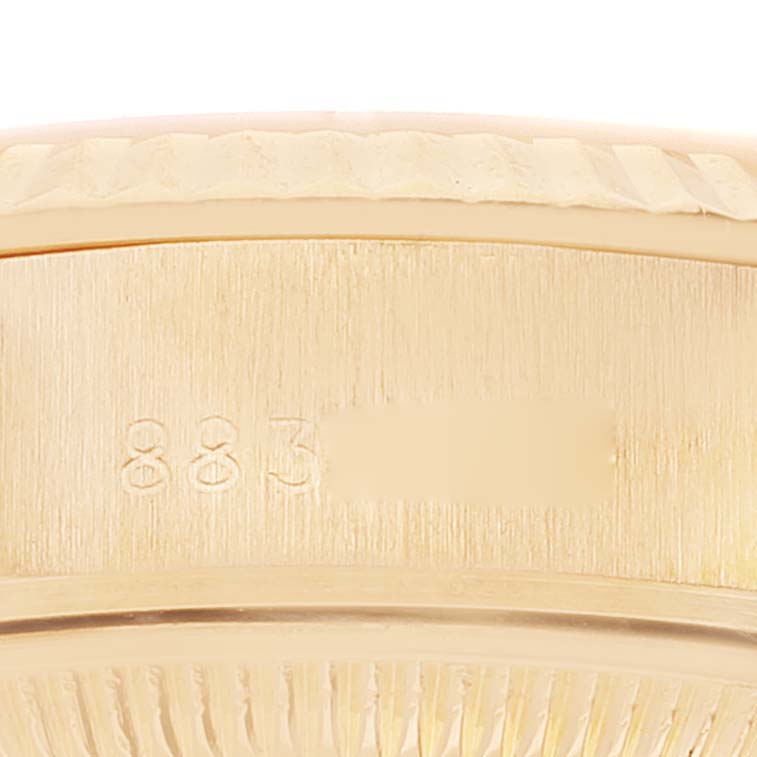 This close-up image shows the side view of the President model Rolex watch case, highlighting the serial number.