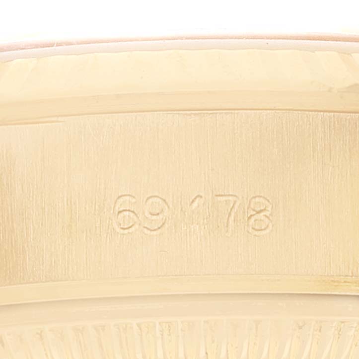 This close-up shows the model number "69178" engraved inside the case of a Rolex President 69178 Women
s Yellow Gold Champagne Dial 69178 Women
s Yellow Gold Champagne Dial watch.