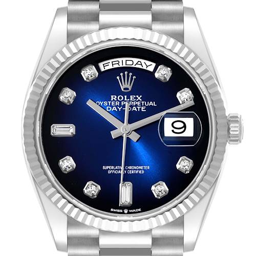 The Rolex President model is shown from the front, featuring the blue dial, day, and date indicators.