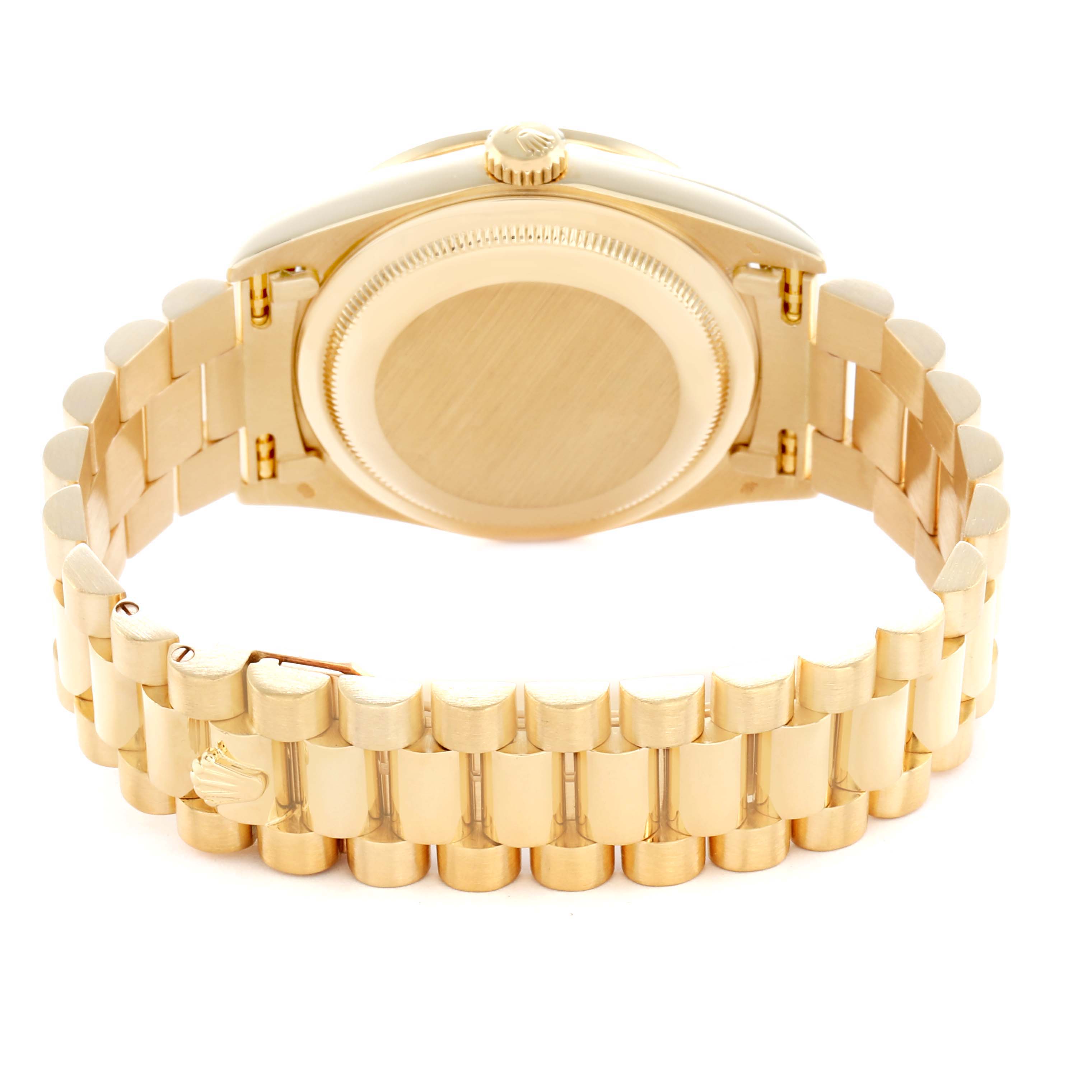 The Rolex President 18388 Men
s Yellow Gold Champagne Dial watch is shown from the back, highlighting the case back and gold bracelet.