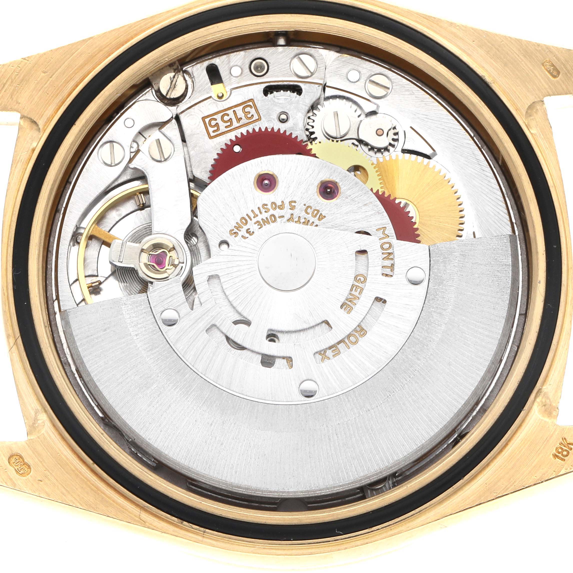 The image shows the movement and internal mechanism of a Rolex President 18388 Men
s Yellow Gold Champagne Dial watch from a top-down angle.