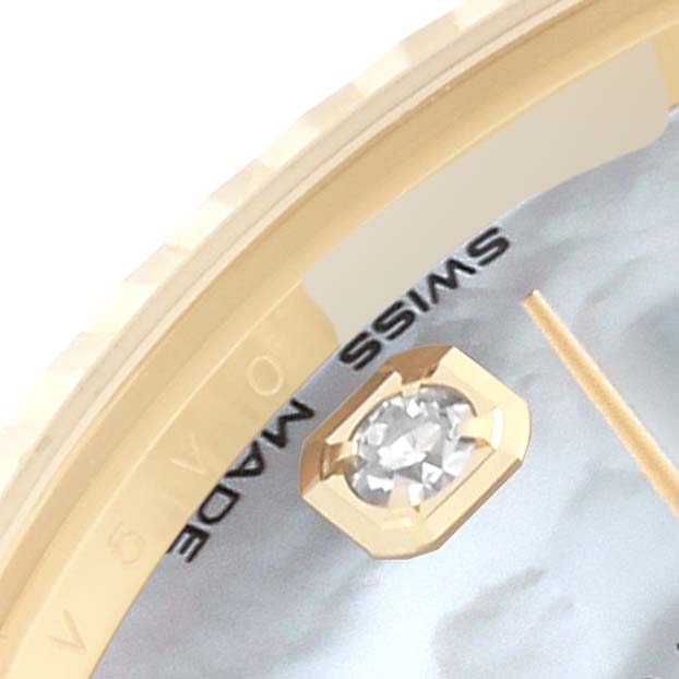 This close-up angle of the Rolex President 178278 Women's Yellow Gold Mother of Pearl Dial 178278 Women's Yellow Gold Mother of Pearl Dial model showcases a portion of the dial, an hour marker with a diamond, and the edge of the bezel.