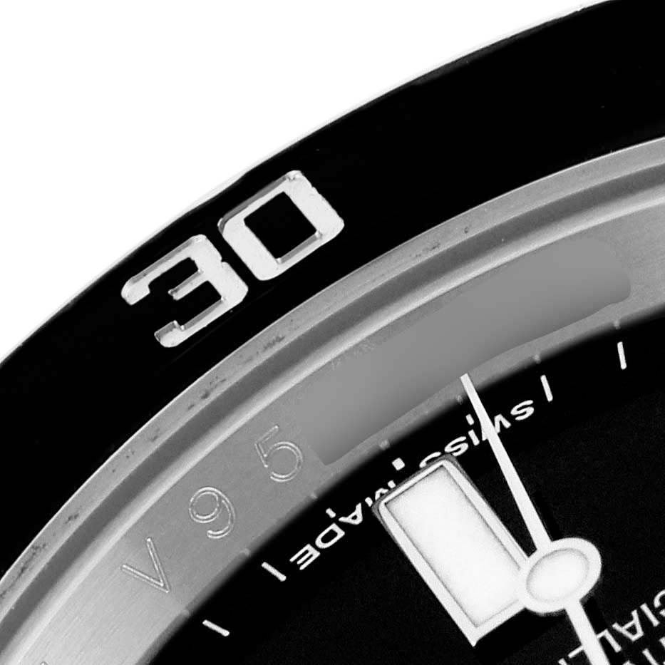 The image shows a close-up of the bezel and part of the dial of a Rolex Submariner 116610 Men
s Stainless Steel Black Dial 116610 Men
s Stainless Steel Black Dial watch, highlighting the "30" marker.