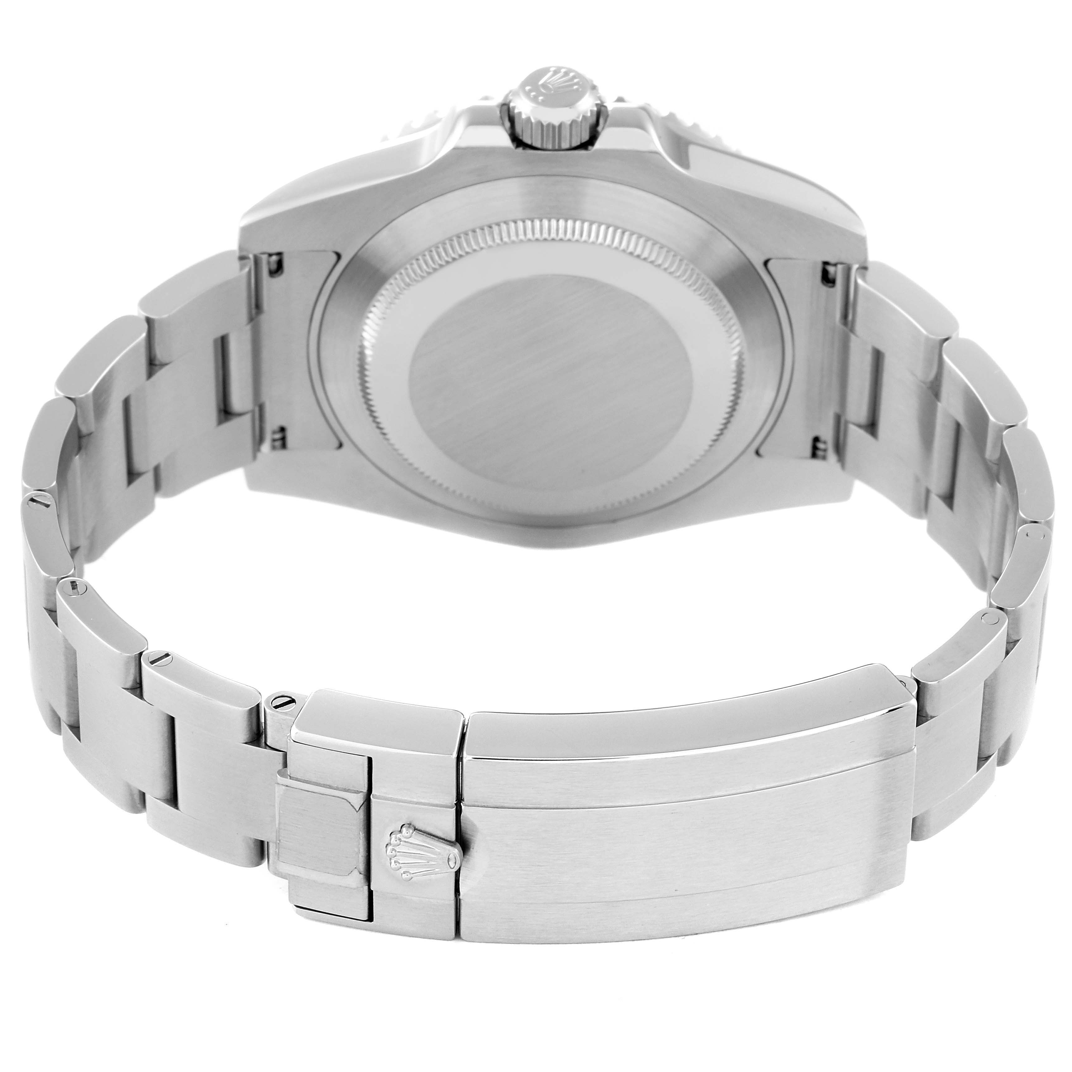 The image shows the back view of a Rolex Submariner 116610 Men
s Stainless Steel Black Dial 116610 Men
s Stainless Steel Black Dial watch, highlighting the case back and bracelet clasp.