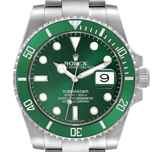 The Rolex Submariner watch is shown from a frontal angle, highlighting its green bezel and dial with a date window.