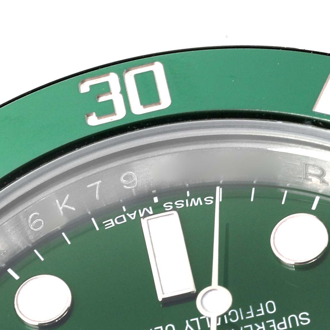 The image shows a close-up of the green bezel and dial of a Rolex Submariner 116610LV Men
s Stainless Steel Green Dial 116610LV Men
s Stainless Steel Green Dial watch, highlighting the "30" marking.