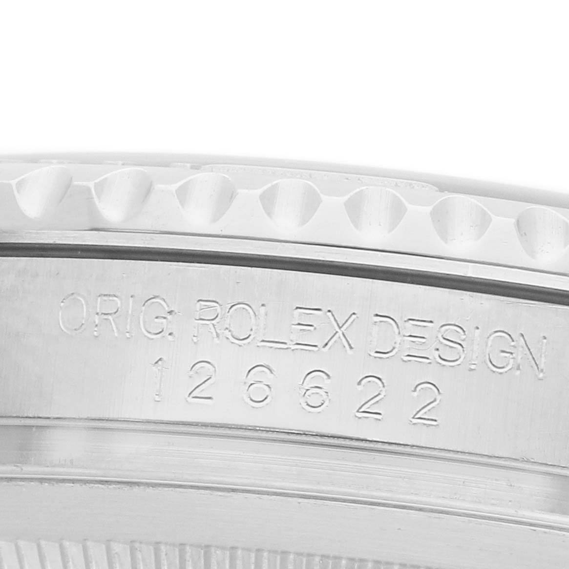 The image shows a close-up of the Rolex Yacht-Master 126622 Men
s Stainless Steel Grey Dial model
s case side, featuring the engraving "ORIG ROLEX DESIGN 126622."