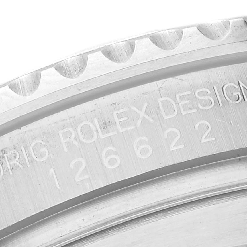 The image shows a close-up of the engraved bezel and case of a Rolex Yacht-Master 126622 Men's Stainless Steel Blue Dial 126622 Men's Stainless Steel Blue Dial watch.