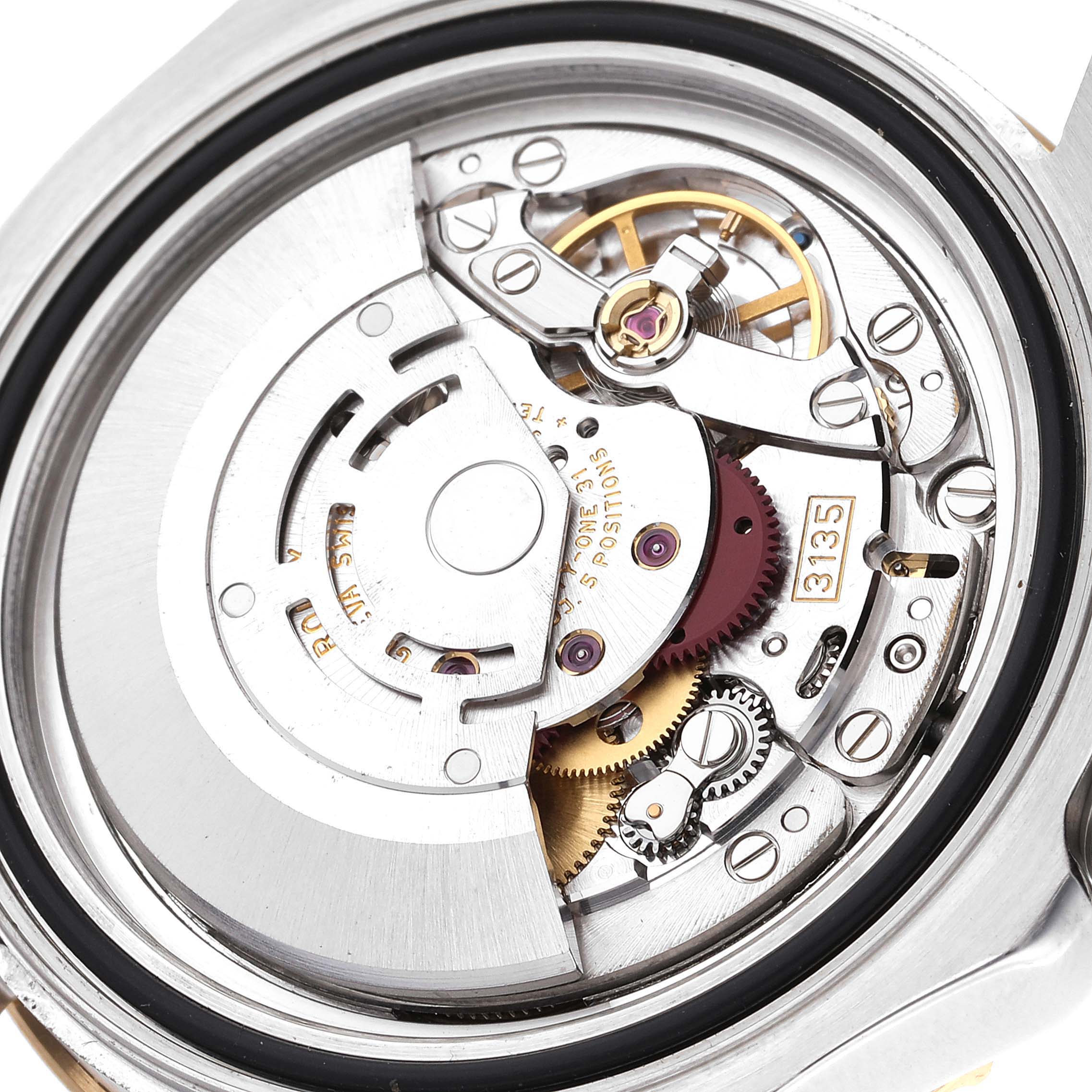 This image shows a close-up of the movement mechanism inside a Rolex Yacht-Master 16623 Men
s Steel and Gold (two tone) Champagne Dial 16623 Men
s Steel and Gold (two tone) Champagne Dial watch.