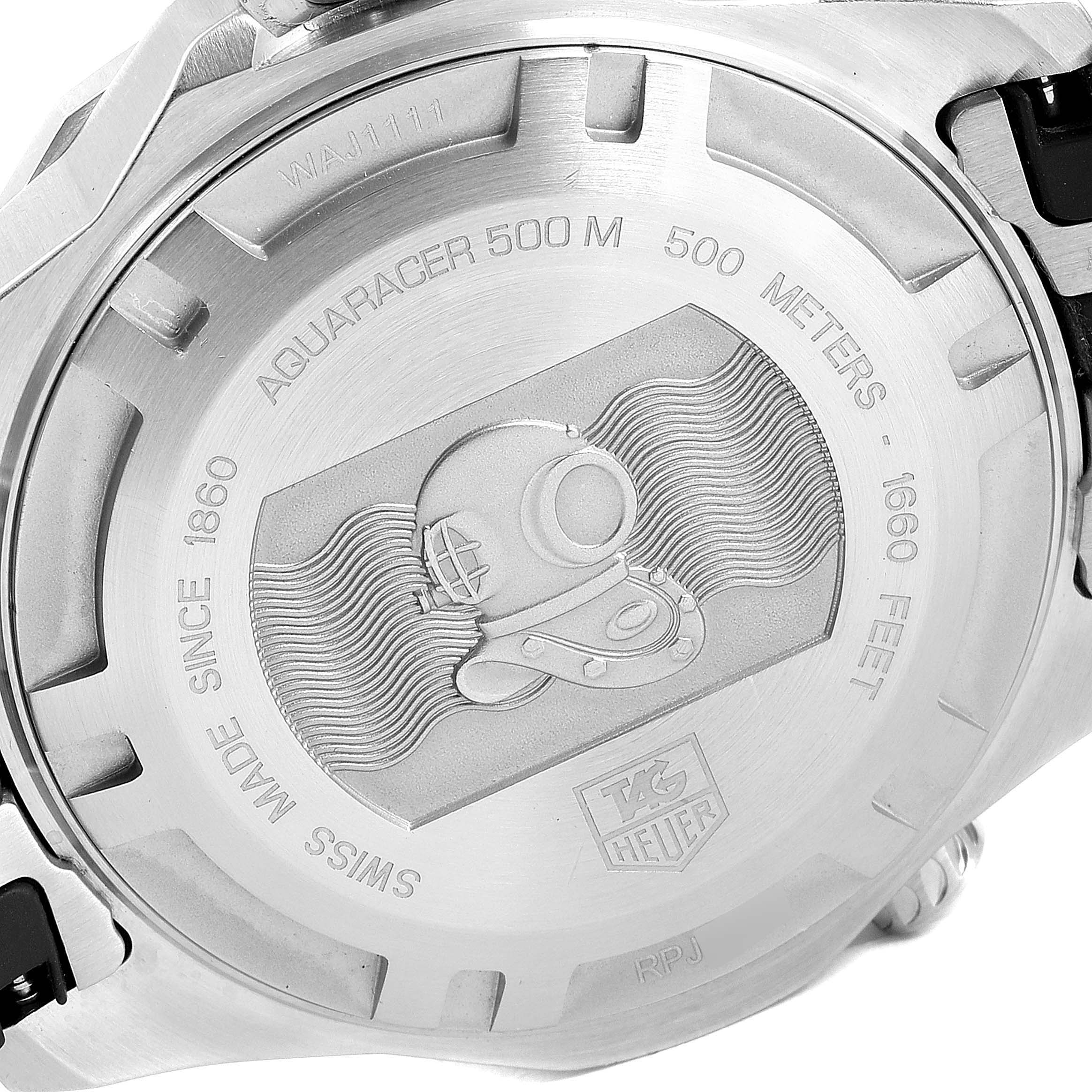 The image shows the back case of a Tag Heuer Aquaracer WAJ1111.FT6015 Men's Stainless Steel Grey Dial WAJ1111.FT6015 Men's Stainless Steel Grey Dial watch, highlighting the brand, model, and water resistance details.