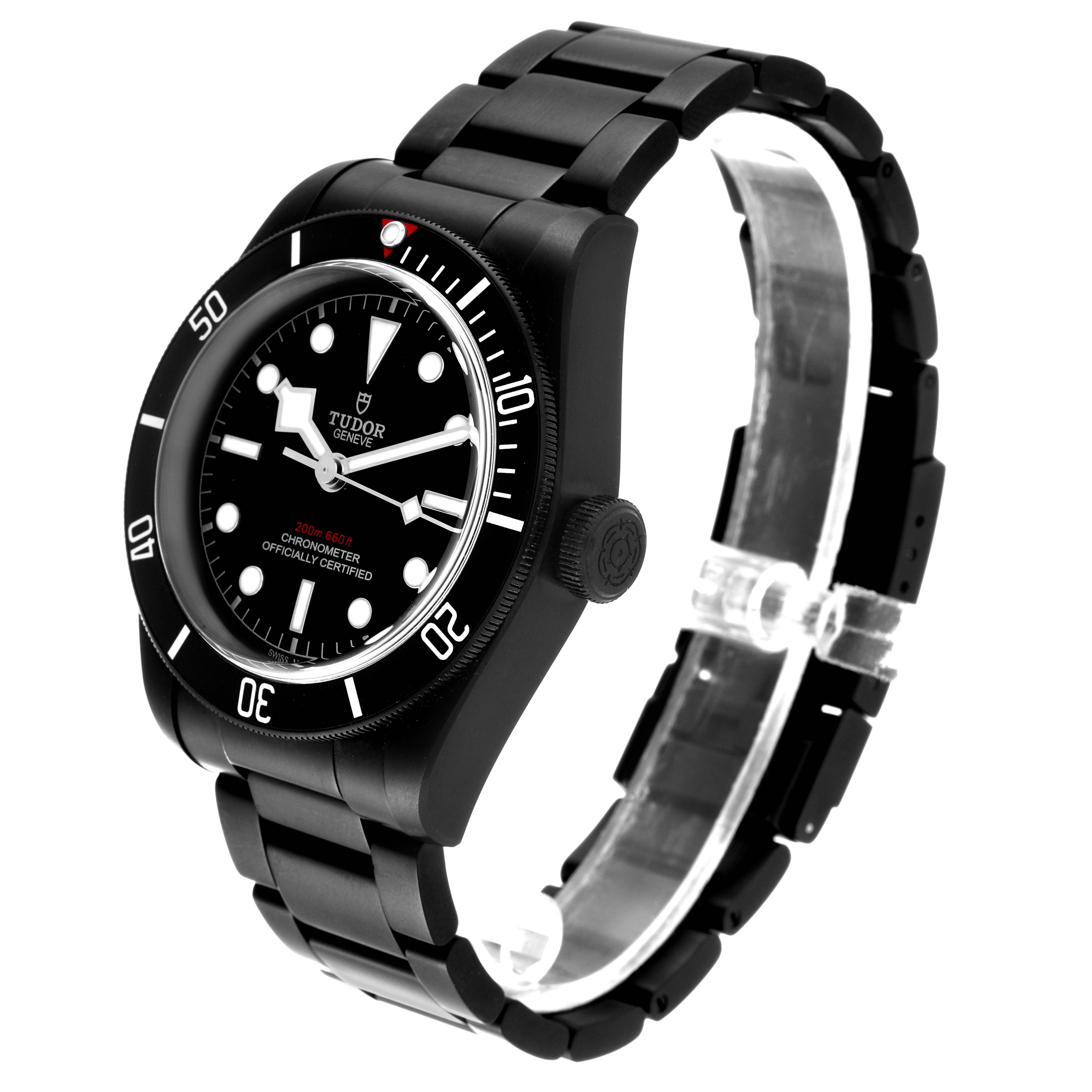 This image shows a side and partial top view of a Tudor Heritage Black Bay 79230DK Men's Stainless Steel Black Dial 79230DK Men's Stainless Steel Black Dial watch, focusing on the face, bezel, and bracelet.