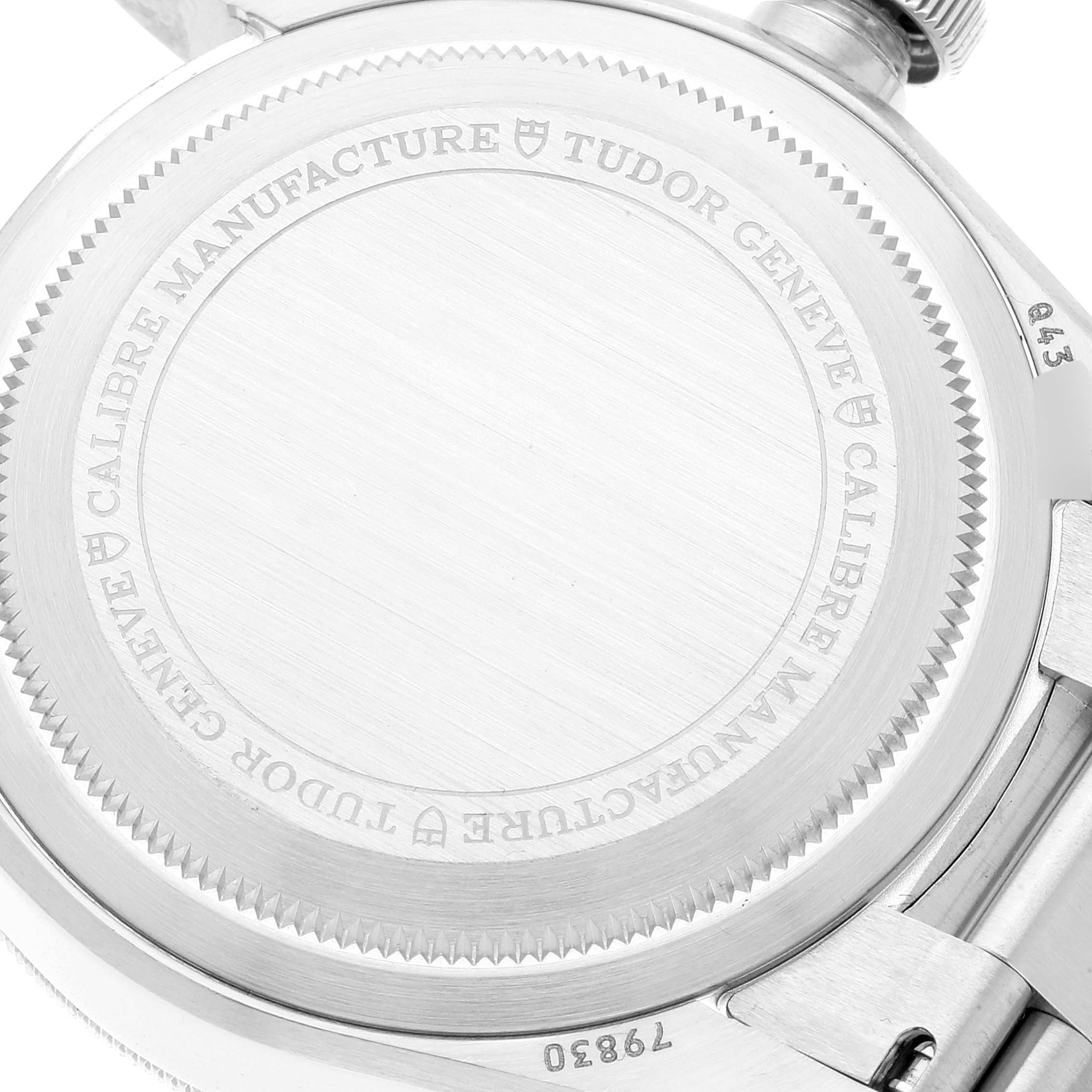 This image shows the back case of the Tudor Heritage Black Bay 79830RB Men's Stainless Steel Black Dial 79830RB Men's Stainless Steel Black Dial watch, highlighting the engraved details.