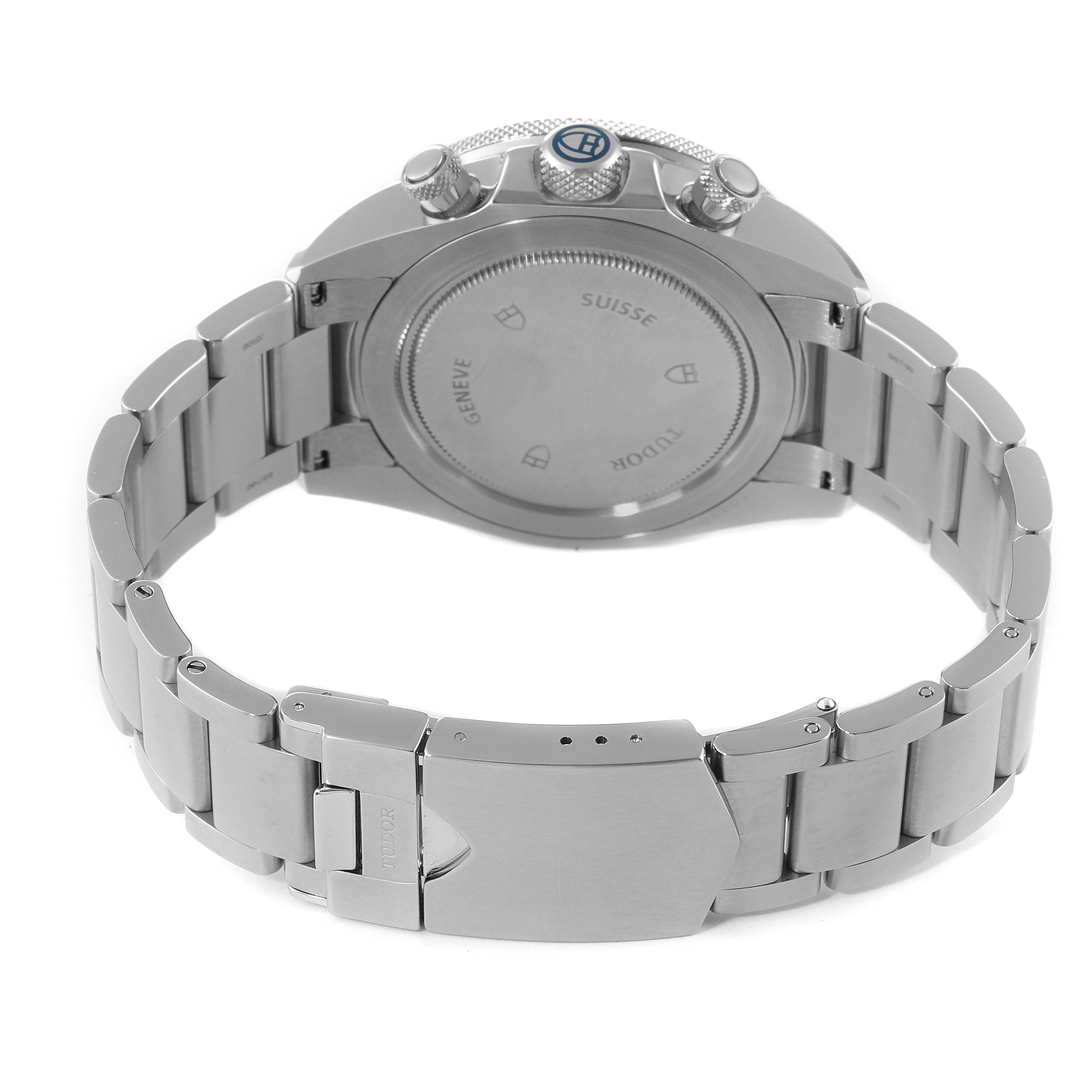 The image shows the back case and bracelet of a Tudor Heritage Chrono 70330B Men's Stainless Steel Blue Dial 70330B Men's Stainless Steel Blue Dial watch from a slightly elevated rear angle.