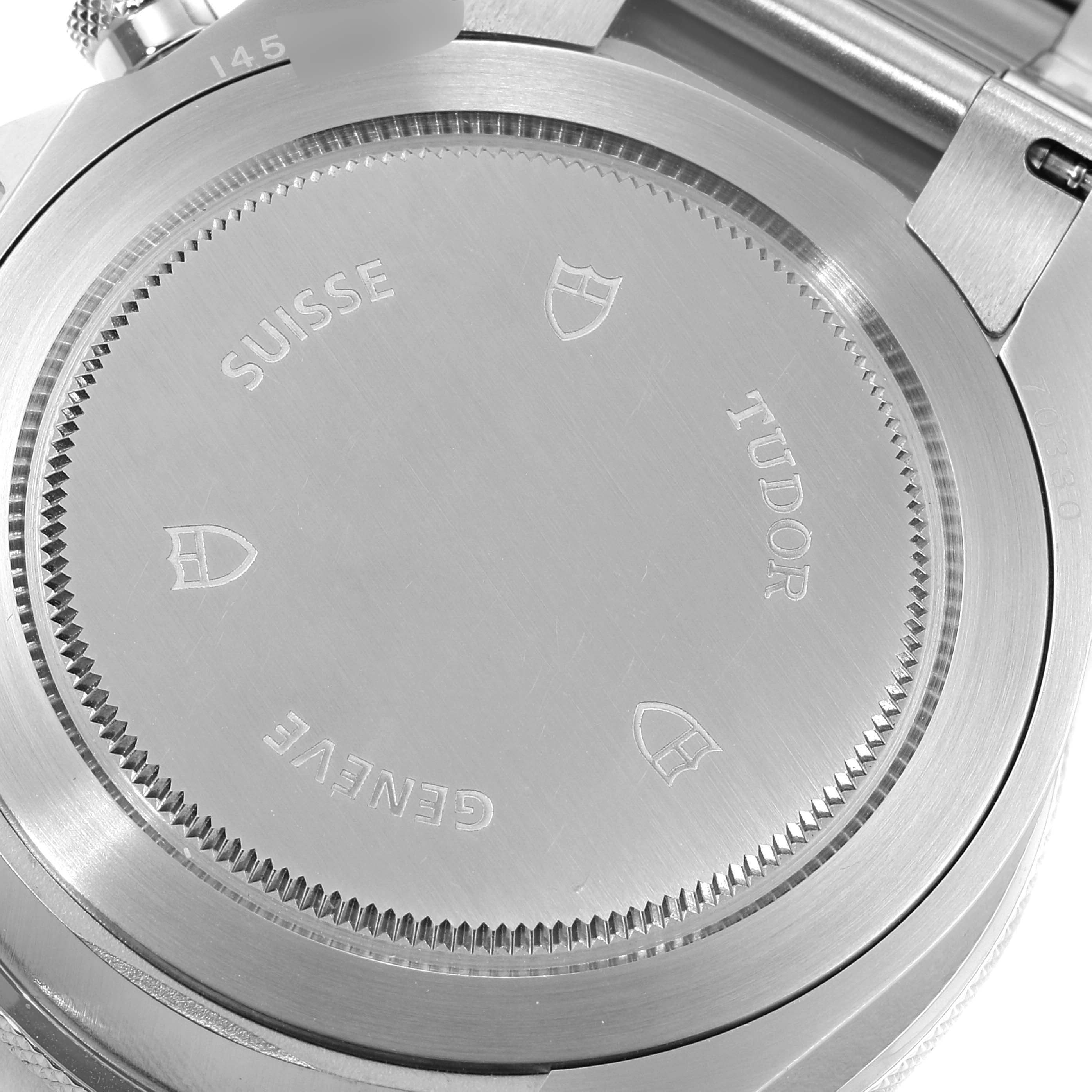 This image shows the back case and part of the side casing of the Tudor Heritage Chrono 70330B Men's Stainless Steel Blue Dial 70330B Men's Stainless Steel Blue Dial watch.