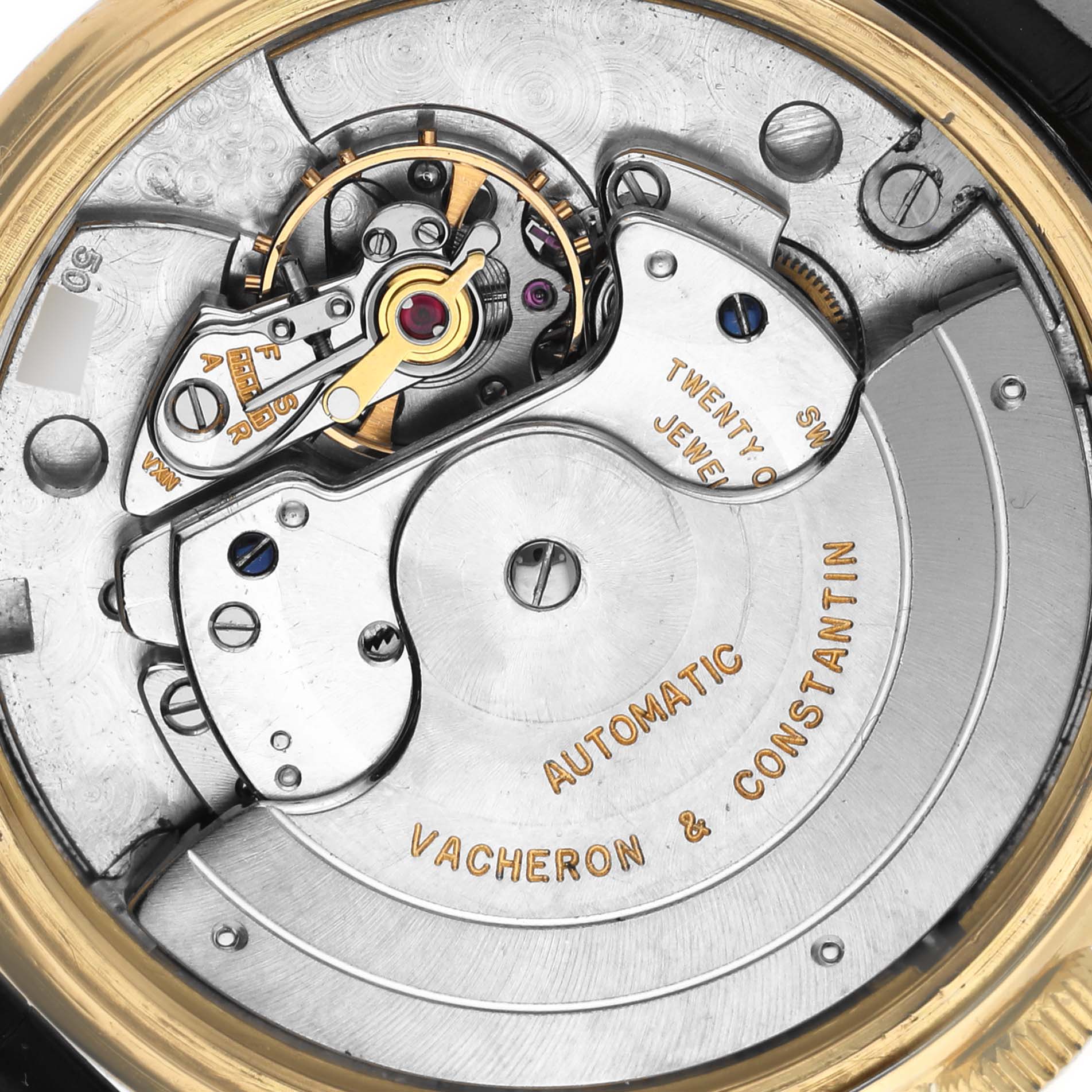 The image shows the back view of a Vacheron Constantin Vintage Men's Yellow Gold Silver Dial Men's Yellow Gold Silver Dial watch, highlighting its automatic movement and intricate components.