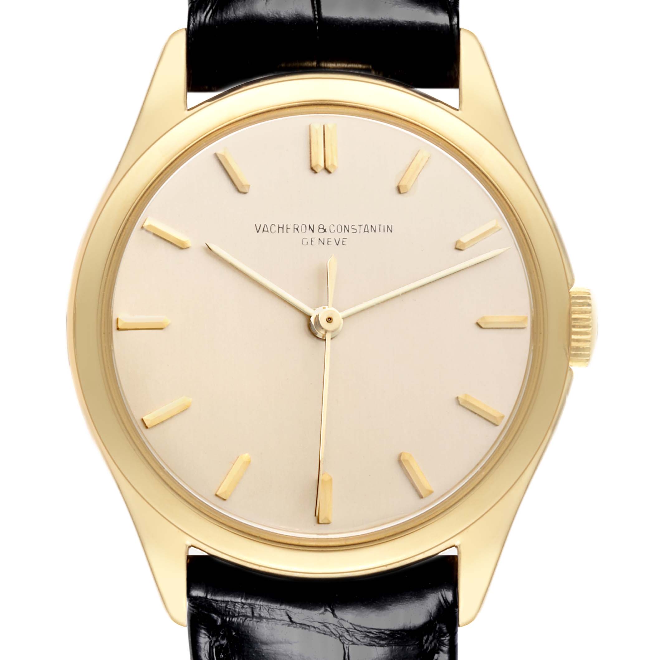 The image shows a classic Vacheron Constantin Vintage Men's Yellow Gold Silver Dial Men's Yellow Gold Silver Dial watch, front view, featuring its dial, hands, and part of the black leather strap.