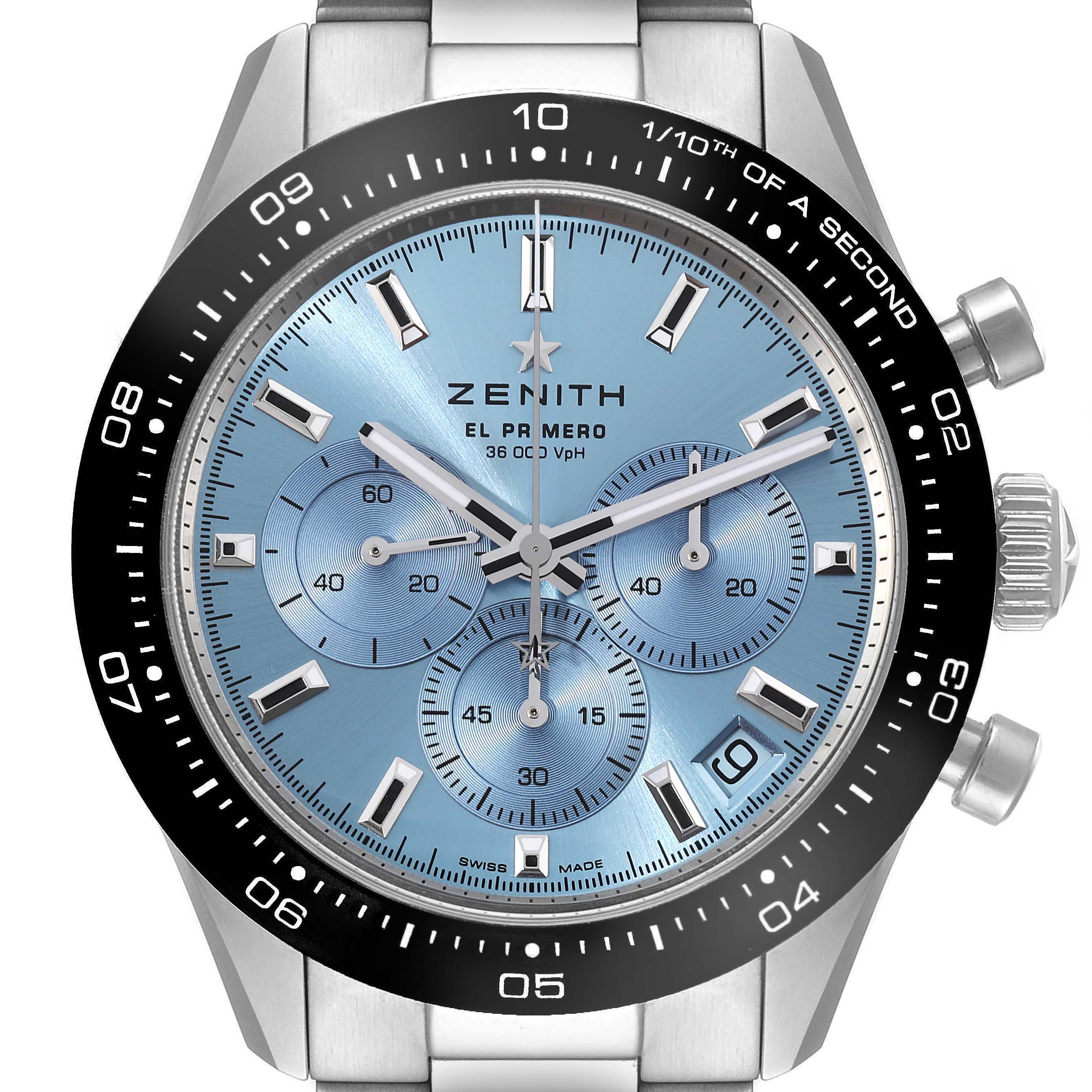 The image shows a Zenith Chronomaster 03.3105.3600 Men's Stainless Steel Blue Dial 03.3105.3600 Men's Stainless Steel Blue Dial watch, featuring a light blue dial with three subdials, a bezel with second markings, and a metal bracelet.