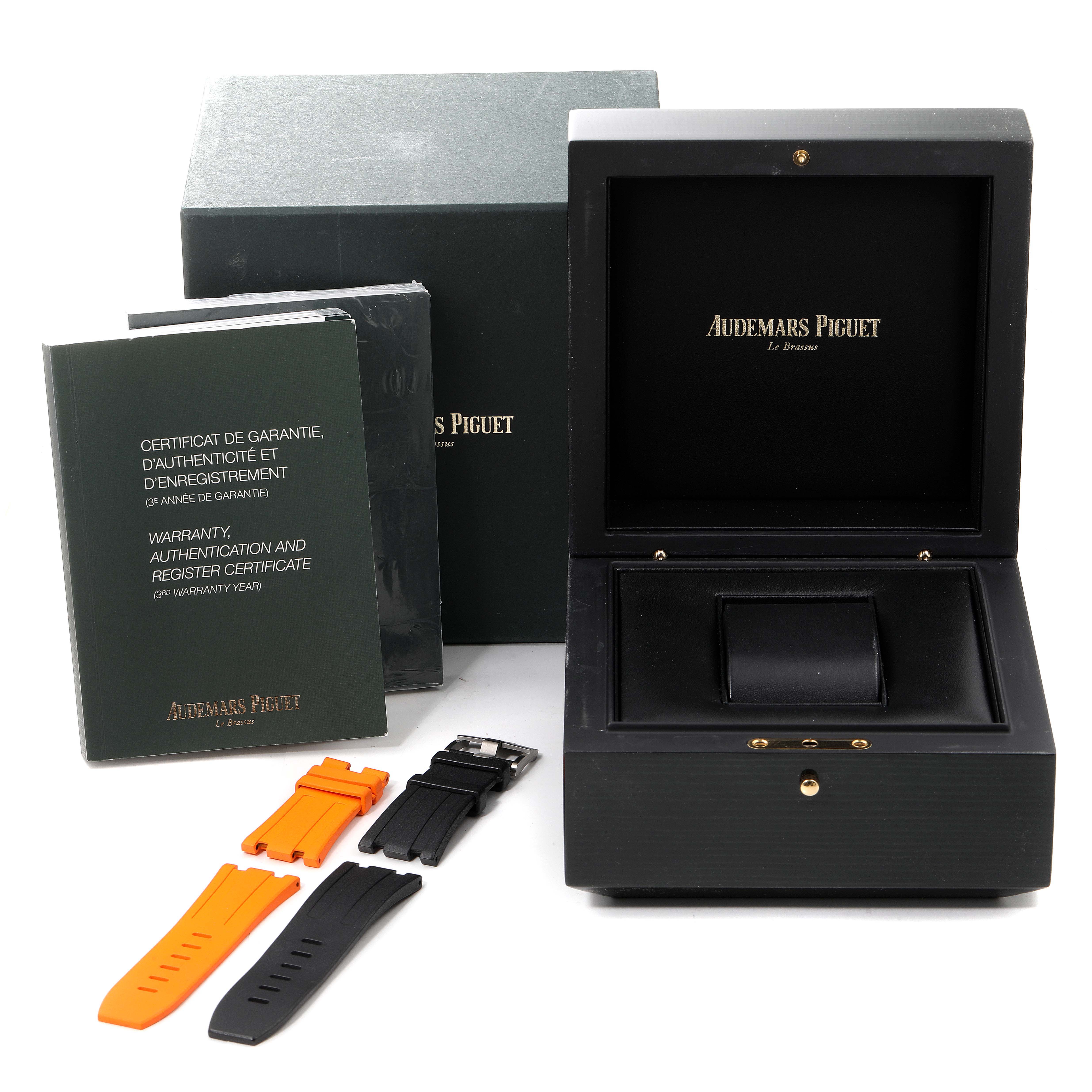 The image shows Audemars Piguet Royal Oak Offshore 15707CE.OO.A002CA.01 Men's Ceramic Black Dial 15707CE.OO.A002CA.01 Men's Ceramic Black Dial packaging, warranty, certificates, and various colored straps.