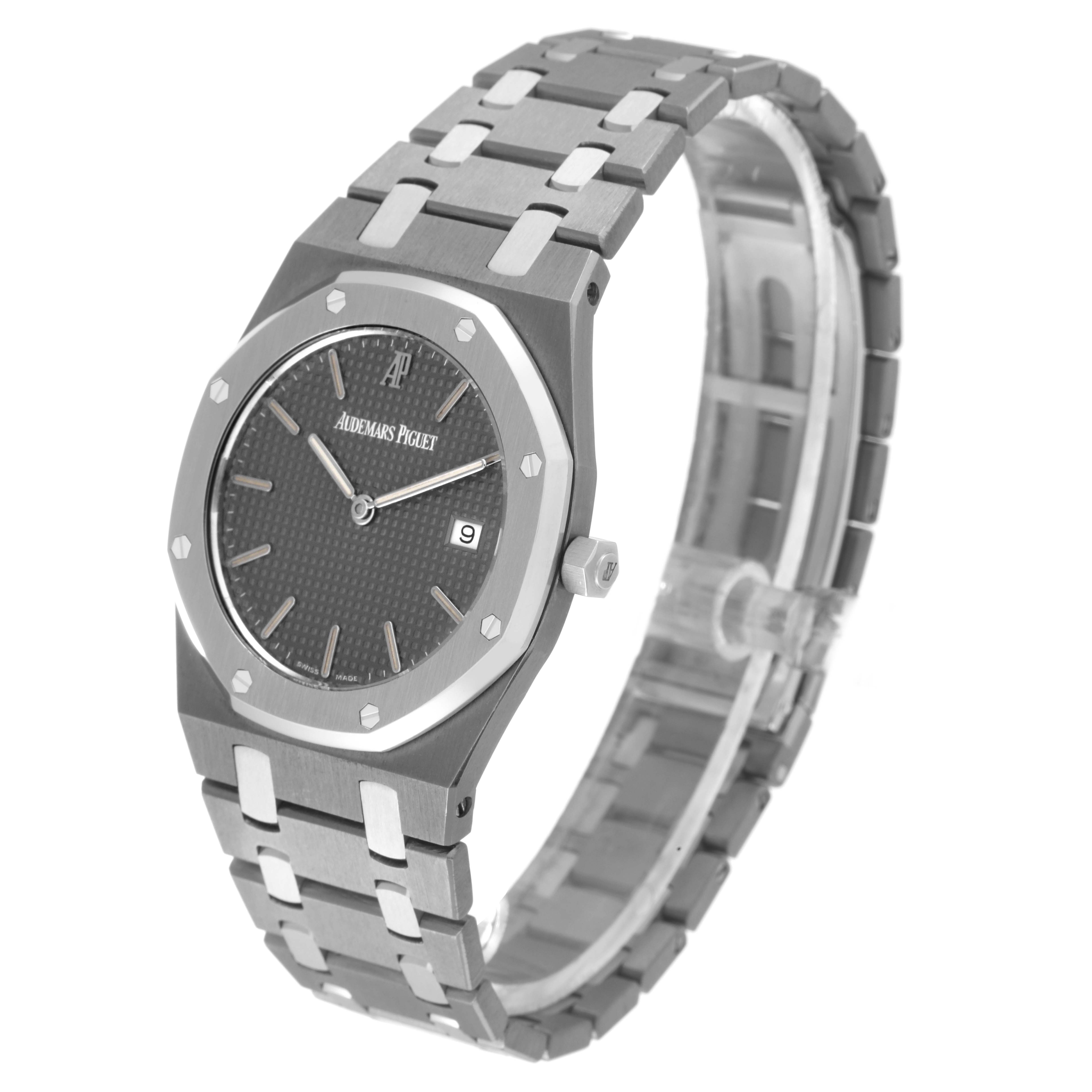 The Audemars Piguet Royal Oak 56175TT.00.0789TT.01 Men's Stainless Steel Grey Dial 56175TT.00.0789TT.01 Men's Stainless Steel Grey Dial watch is shown at a three-quarter angle, displaying the bracelet, watch face, and crown.