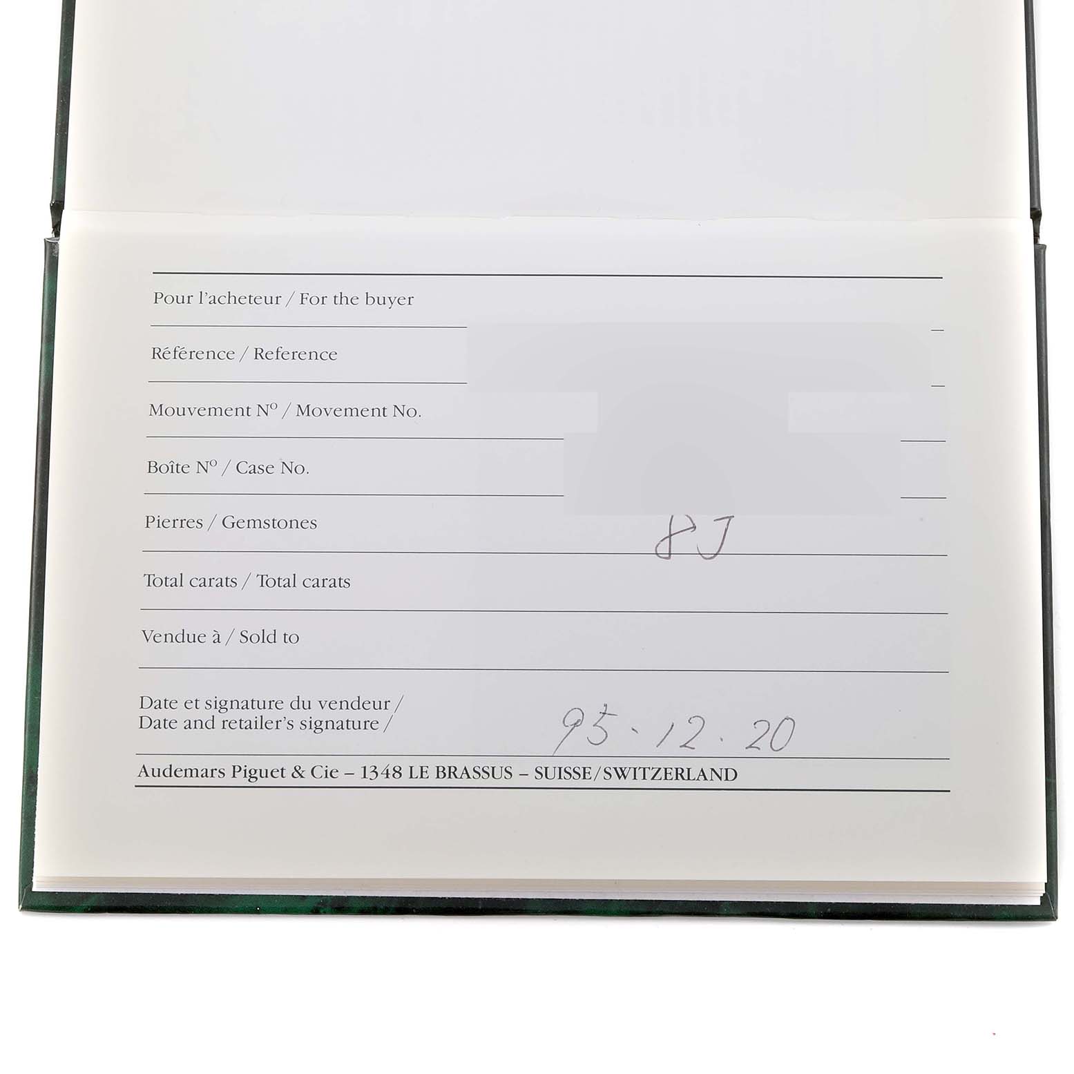 The image shows the official papers of a Royal Oak model by Audemars Piguet, featuring sections for buyer's details, reference, and other specifics.
